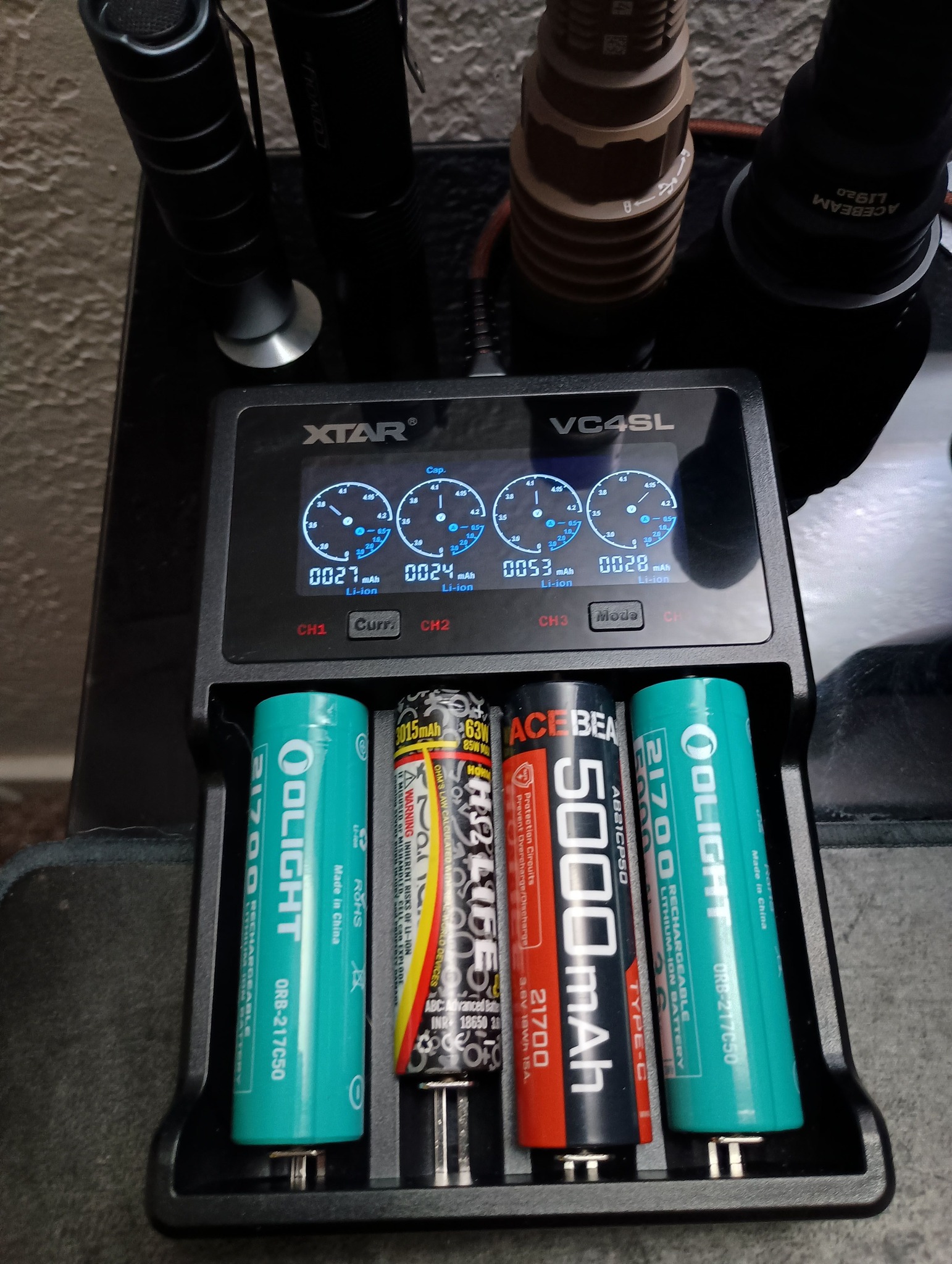 olight flashlight battery charger Ostation X 3-in-1 Automatic Rechargeable AA and vehicle chargers. Olight MCC3 Magnetic USB Charging