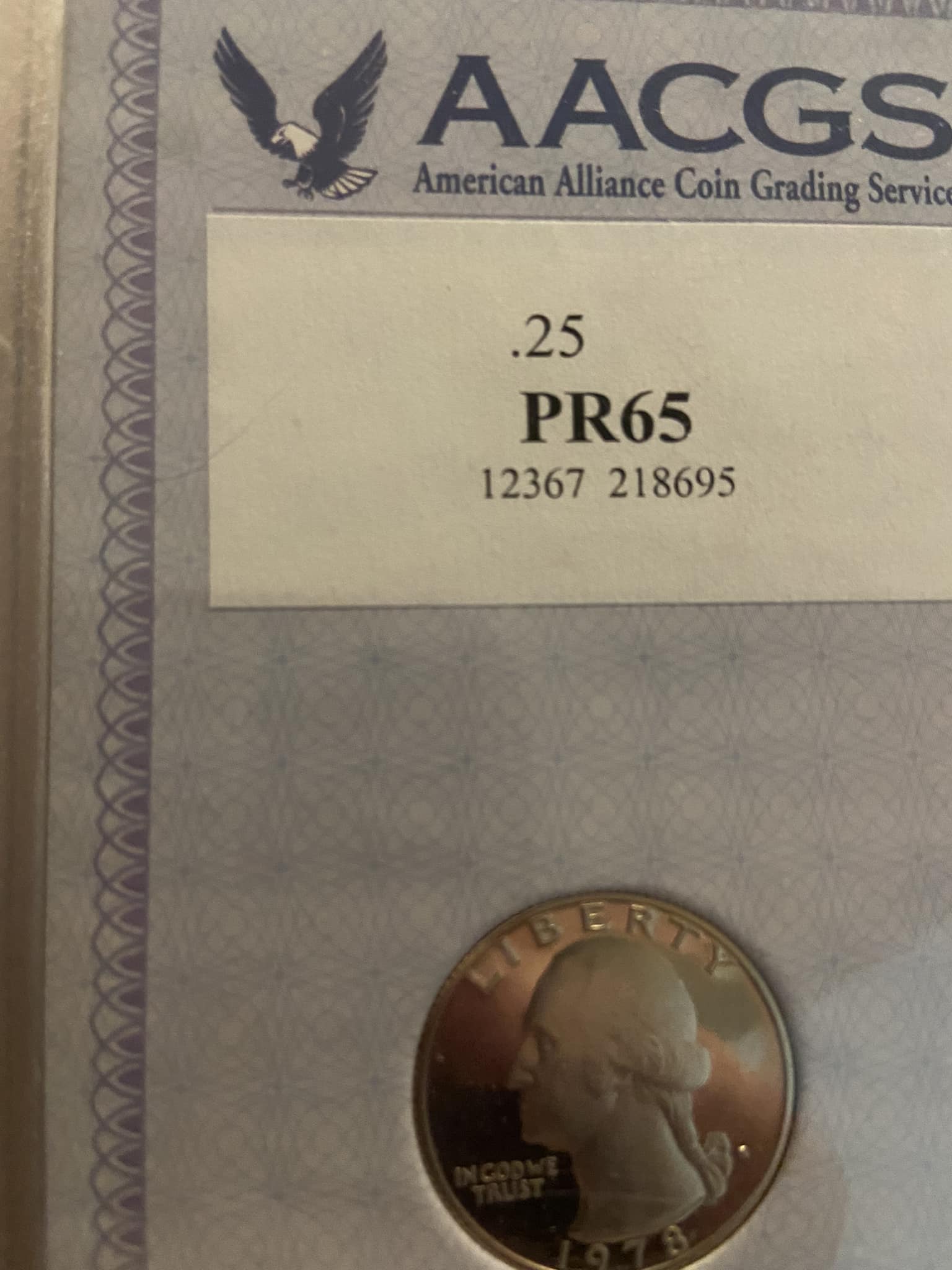 What do the letters and numbers on coins signify?