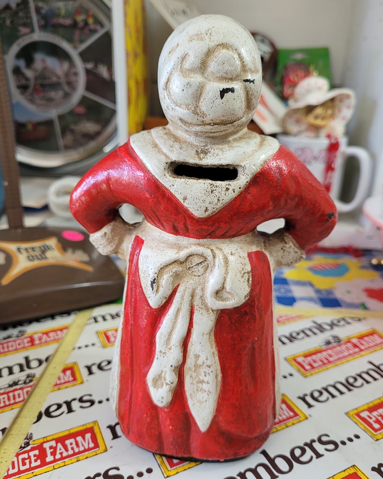 Antique cast iron Aunt Jemima bank, 8