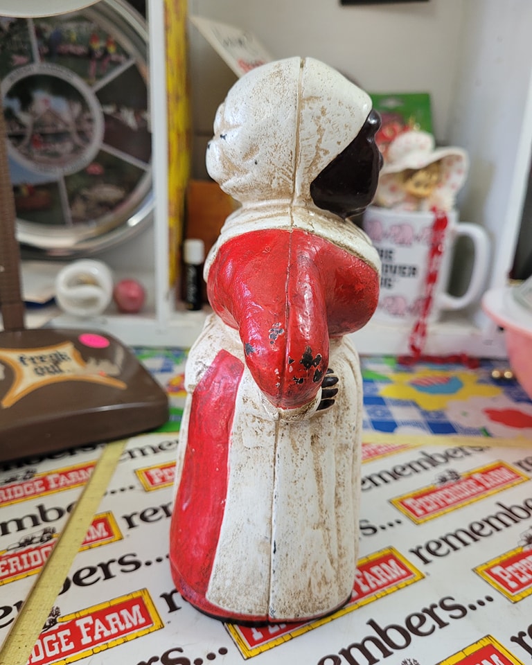 Antique cast iron Aunt Jemima bank, 8