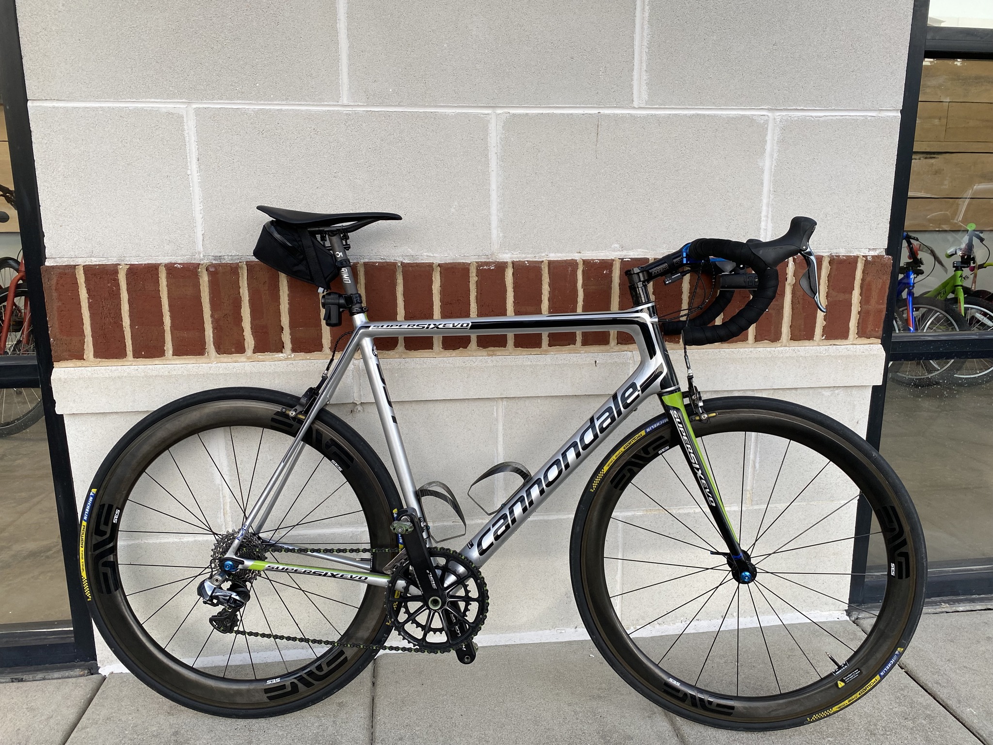 My 2016 SuperSix EVO (with LBS in background). It weighs 11 lbs 