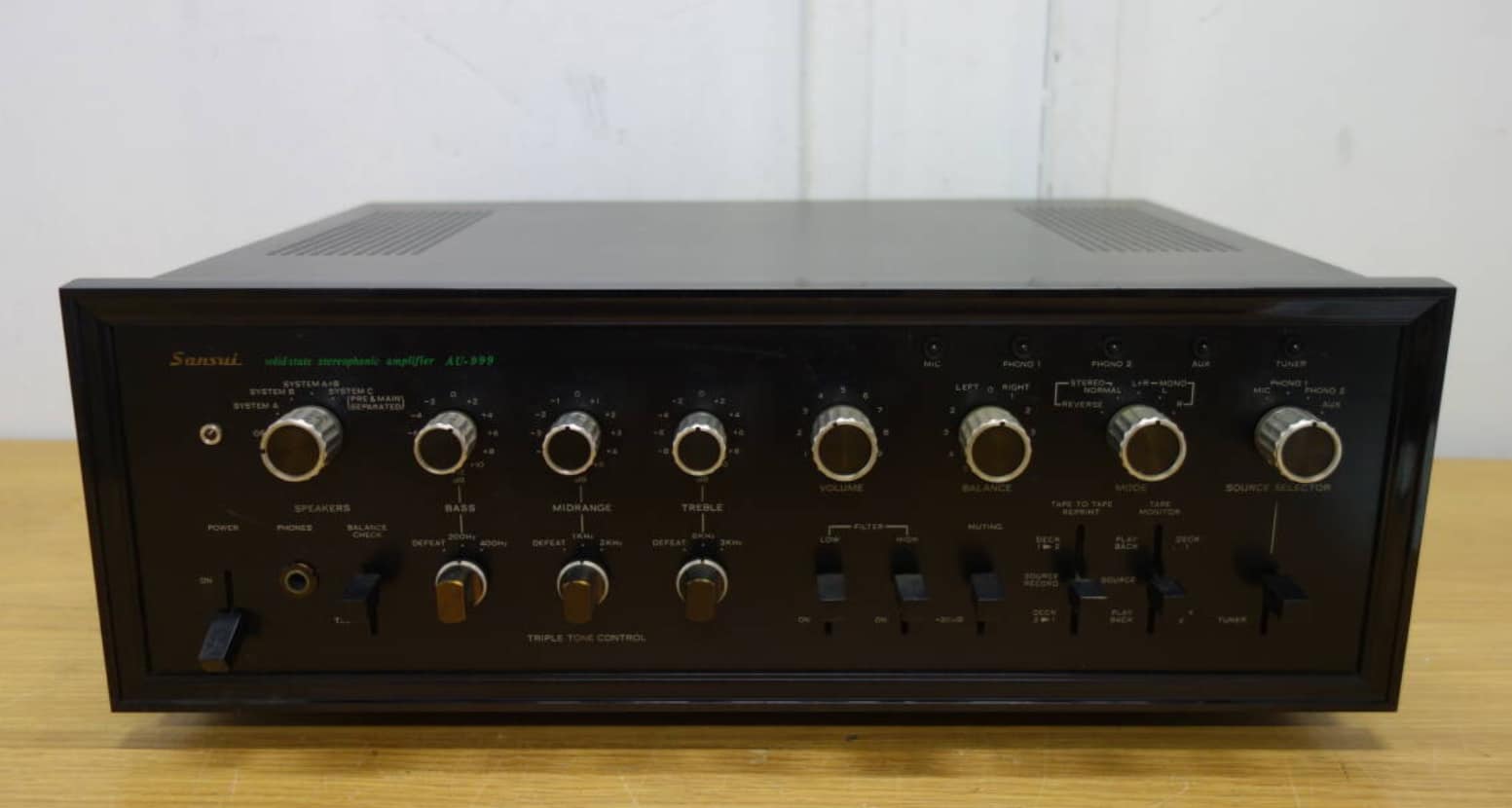 What is a good price for a Sansui AU-999 amplifier that powers up