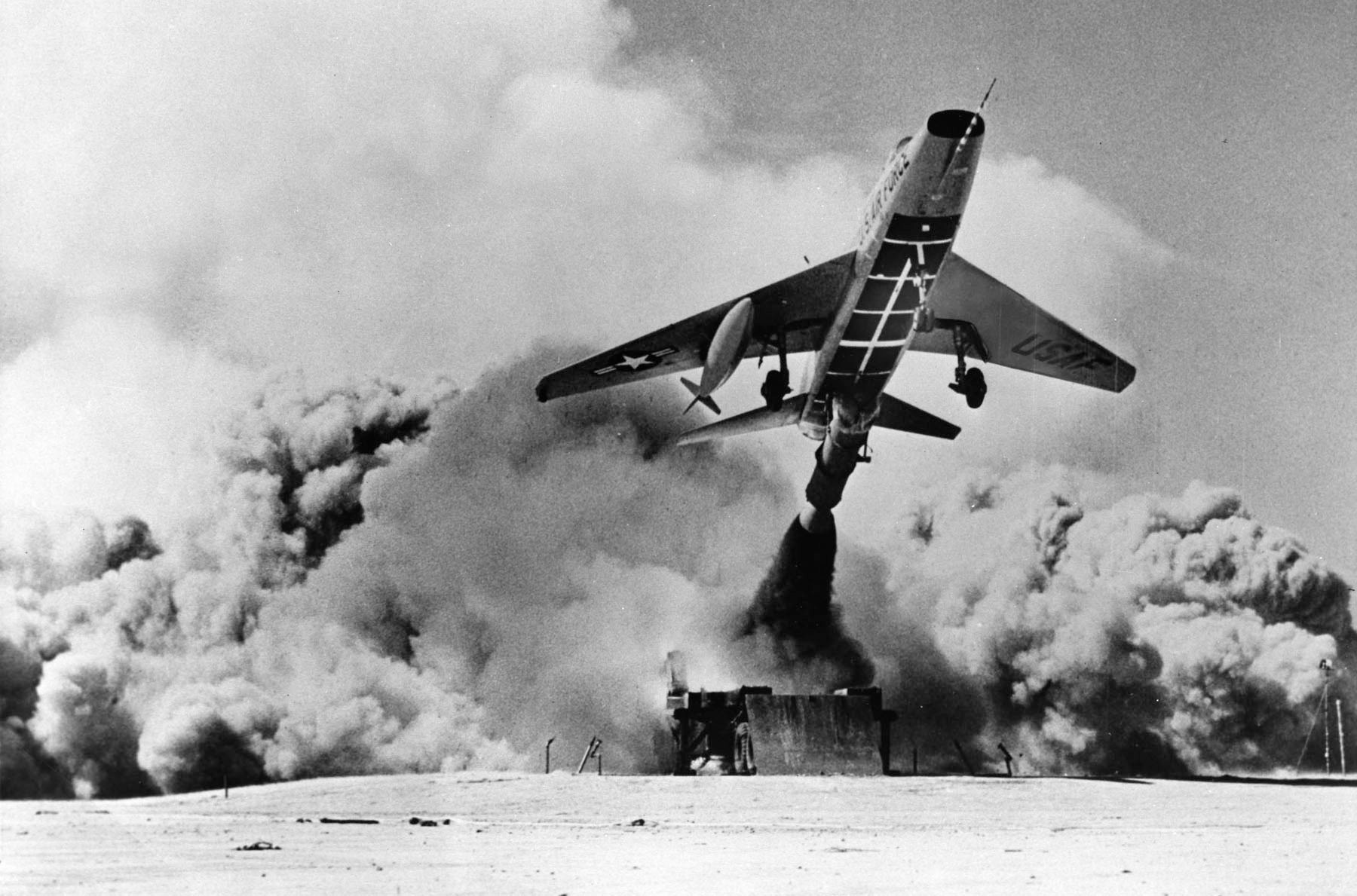 An F-100D Super Sabre lifts off from a zero length launch at