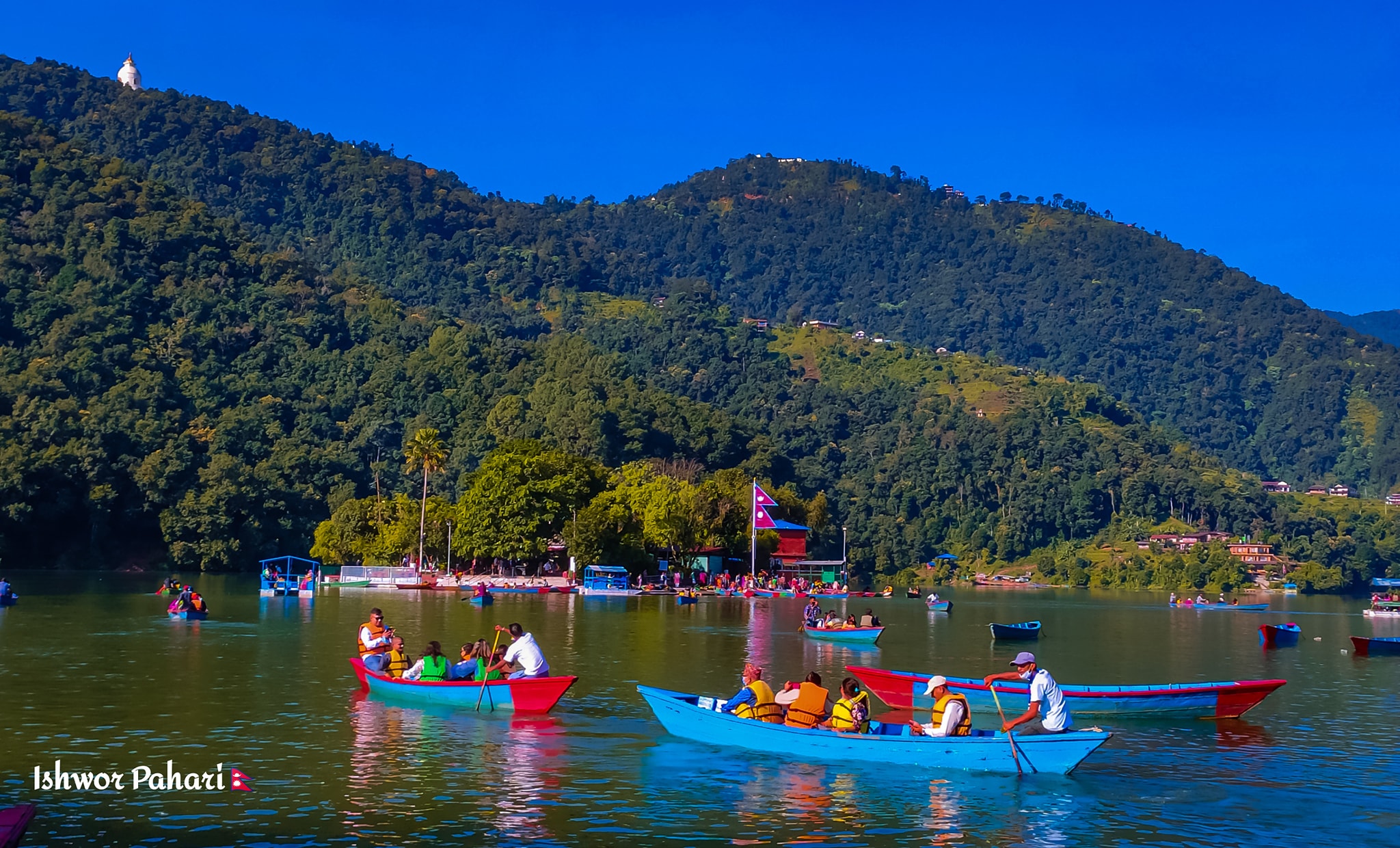 Routine of Nepal banda - Crowd of people in boats for going to worship ...