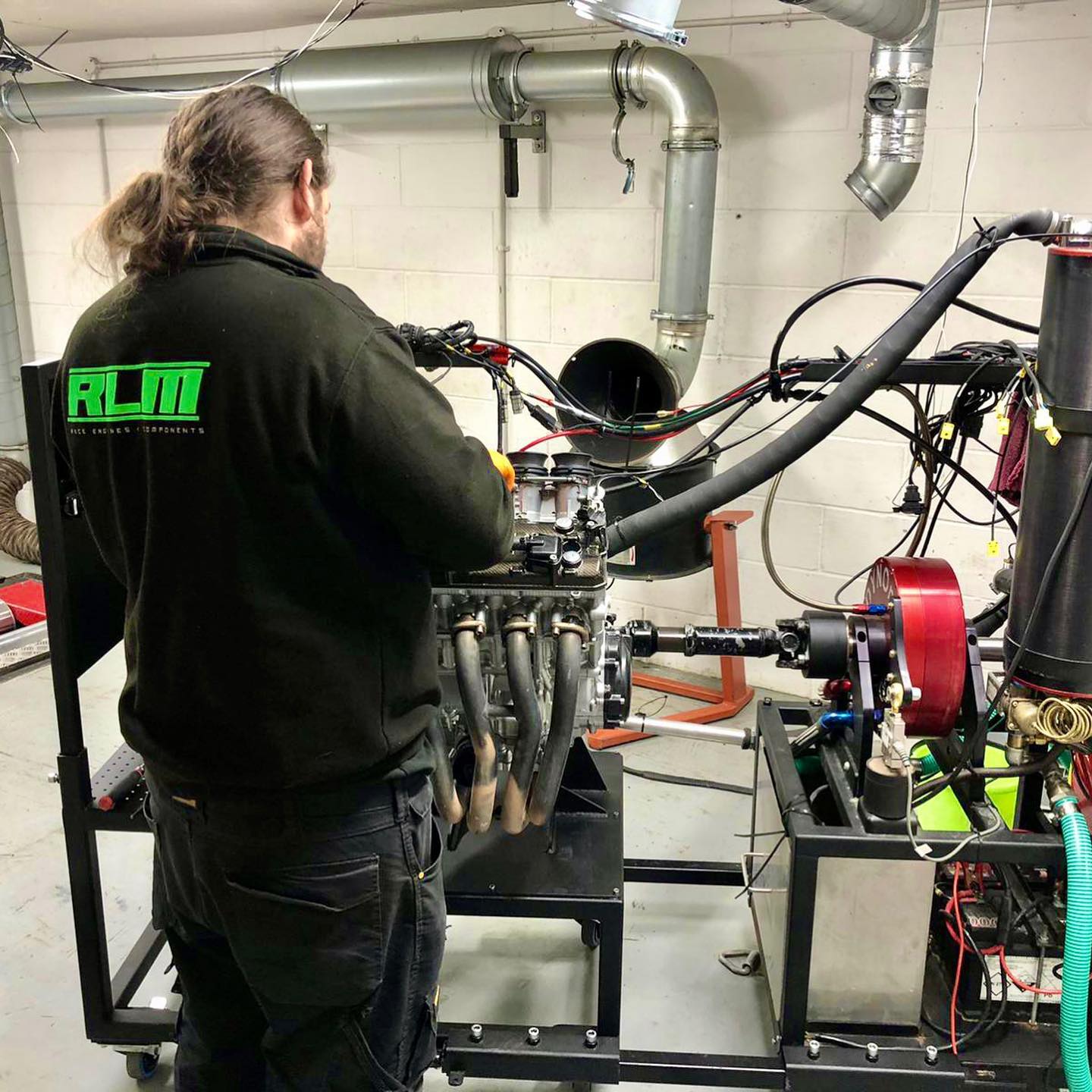 RLM Racing - Our Technician Luke removing a freshly...