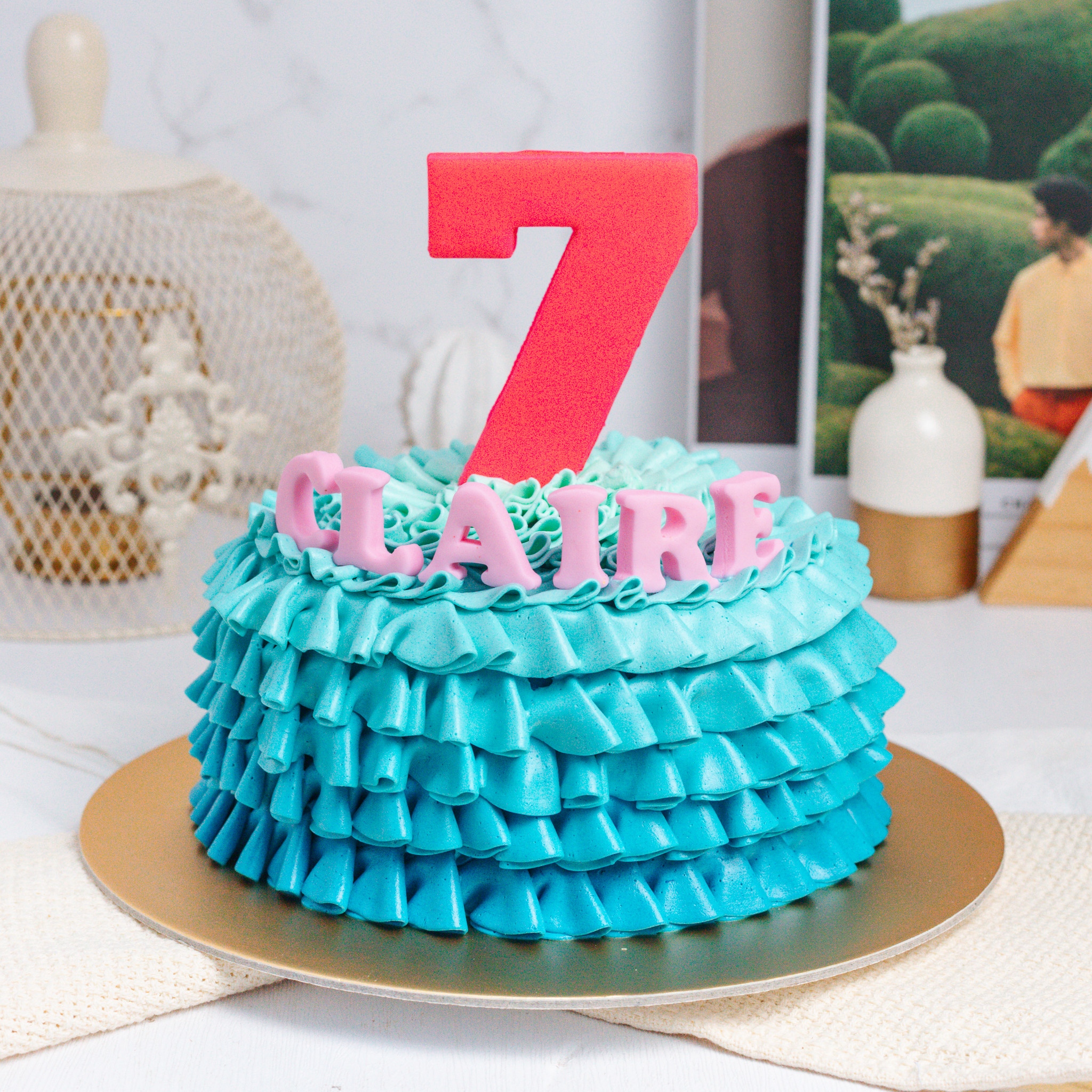 Our piped ruffles cake features an... - Edith Patisserie | Facebook