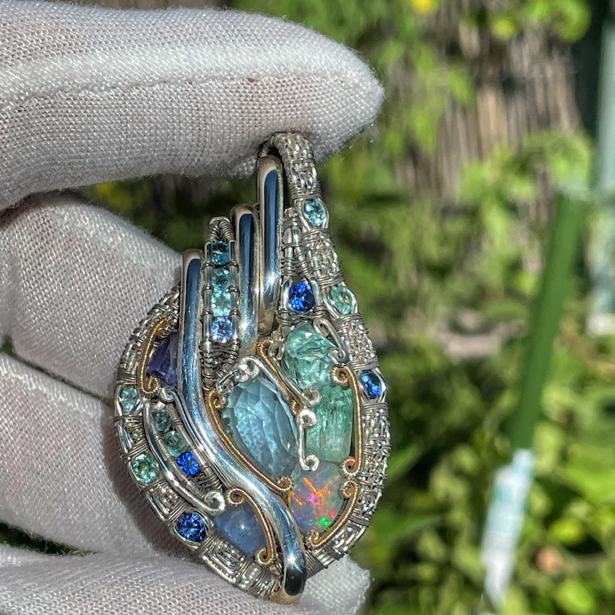 Aquamarine and opal wire wraps with 14k gold accents