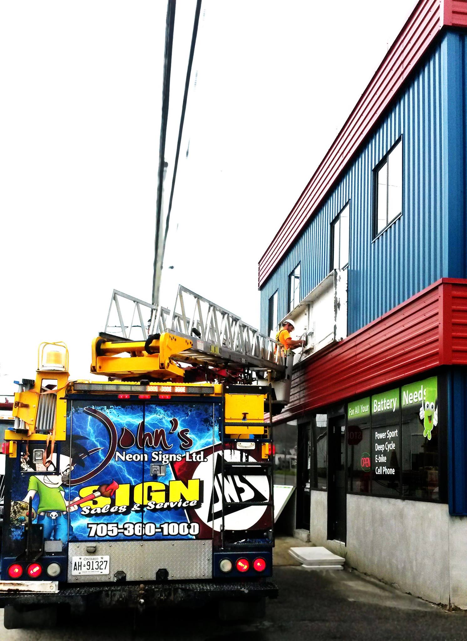 Our crew is out getting your signs... - John's Neon Signs