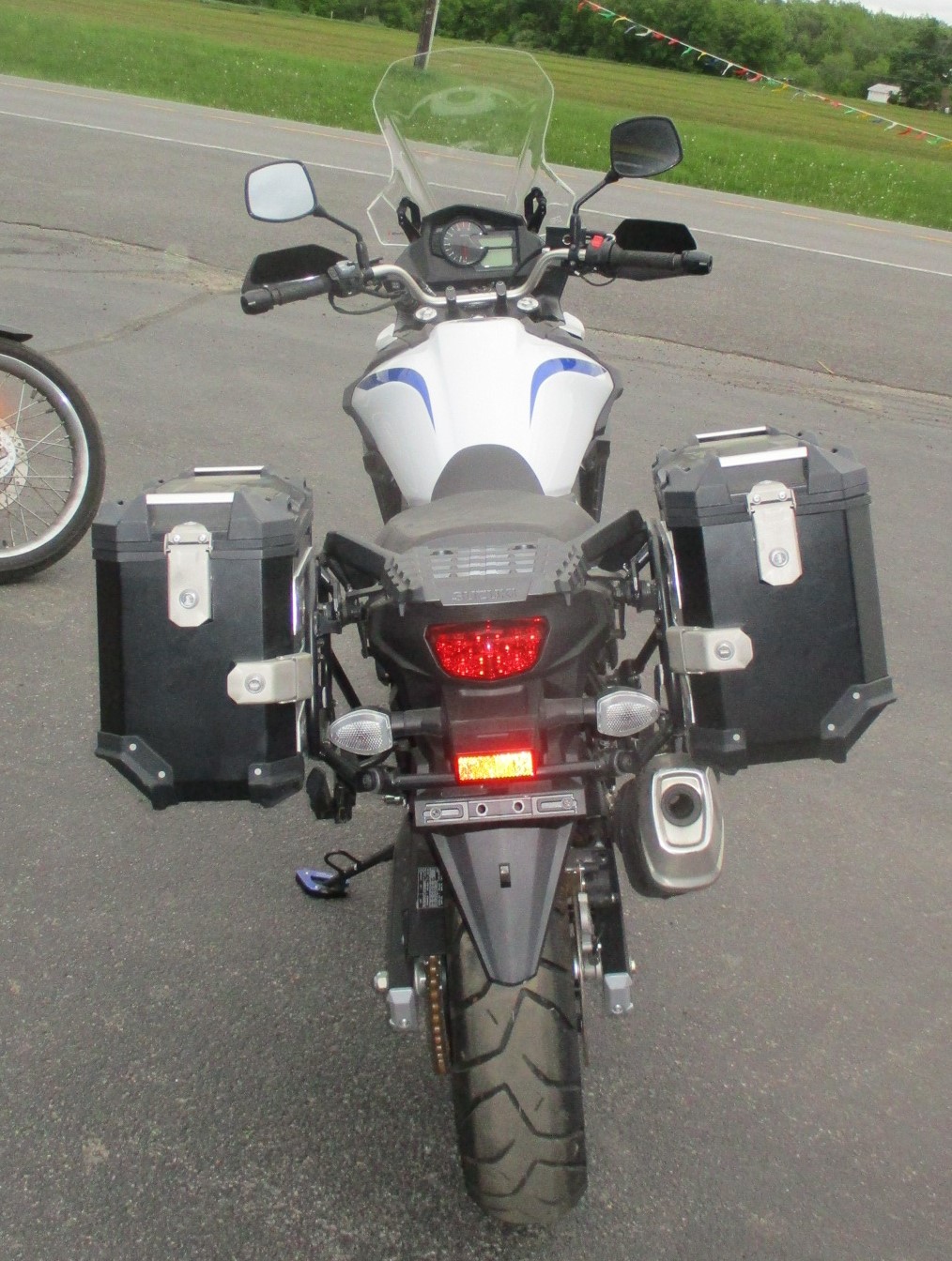 Low-mileage CFMOTO 650 Adventura motorcycle in blue and silver