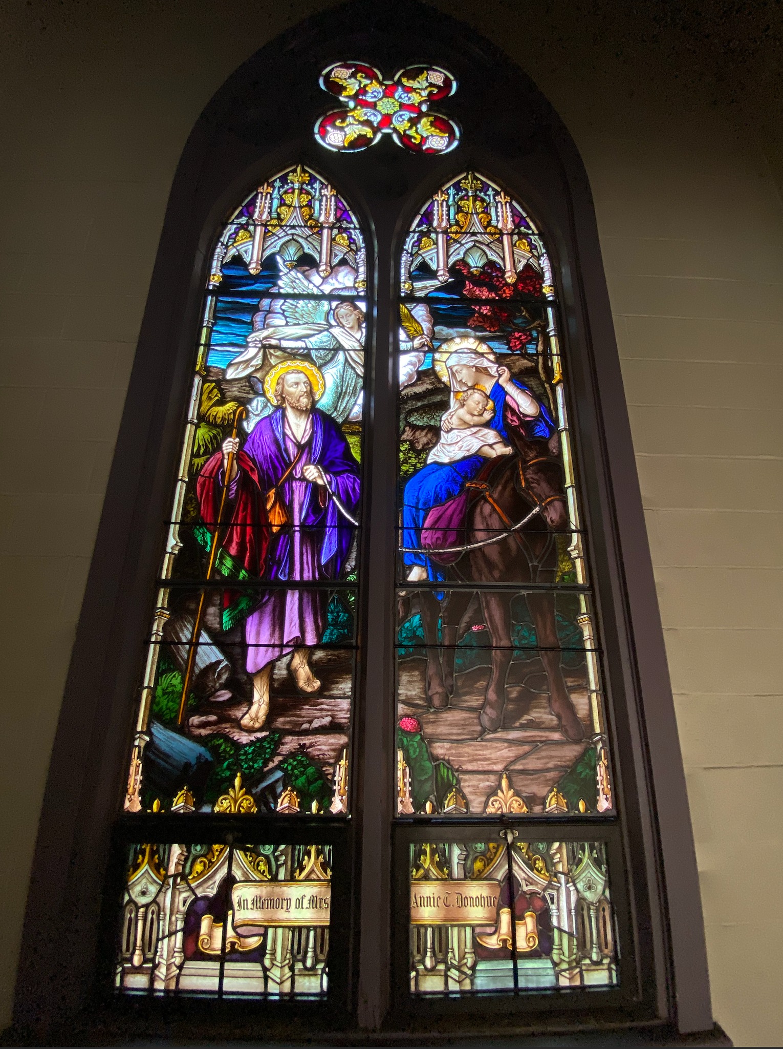 St Joseph Church's stained glass window of the Flight into Egypt