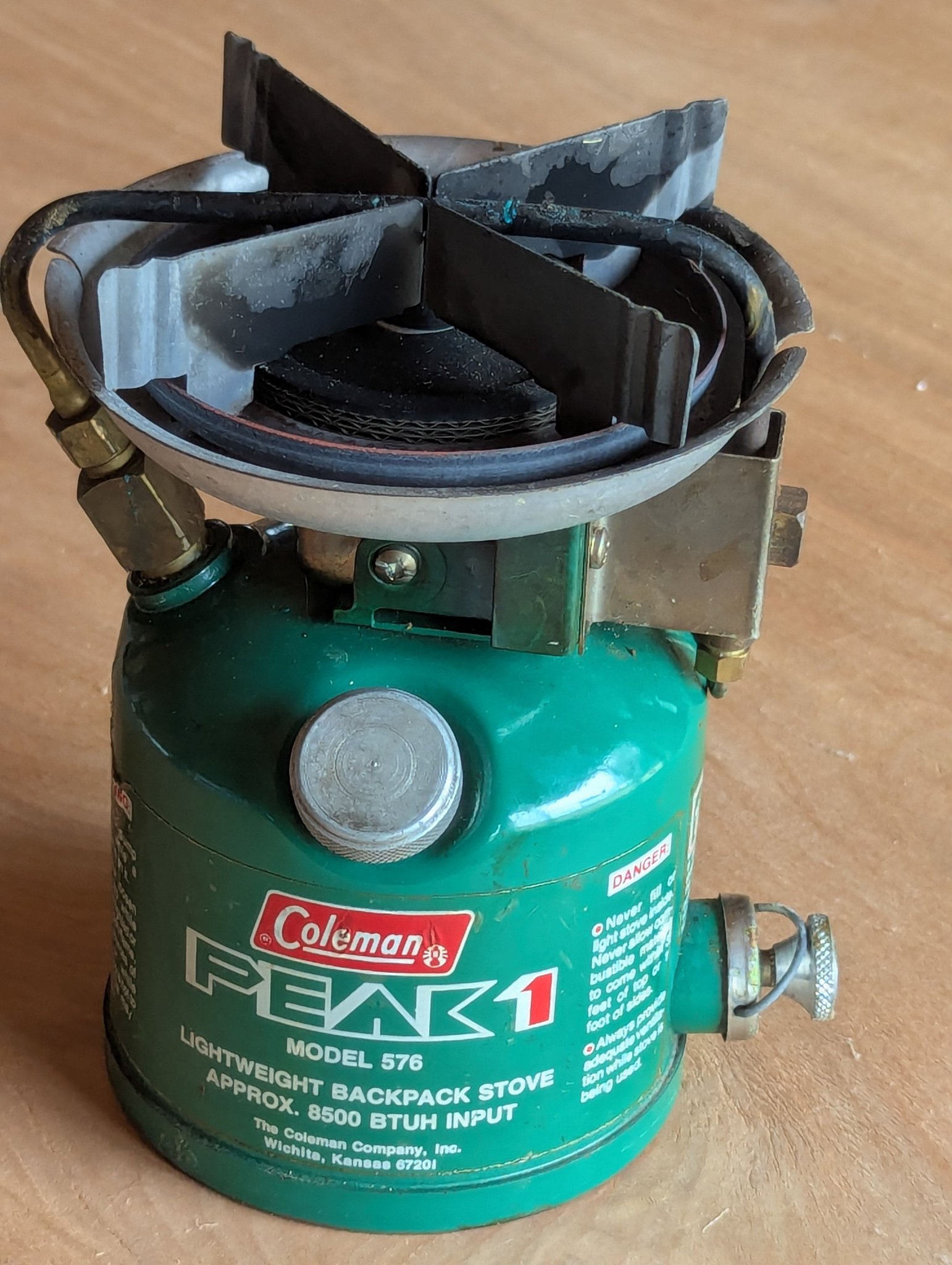 Coleman Peak 1 backpack stove with built-in priming pump and