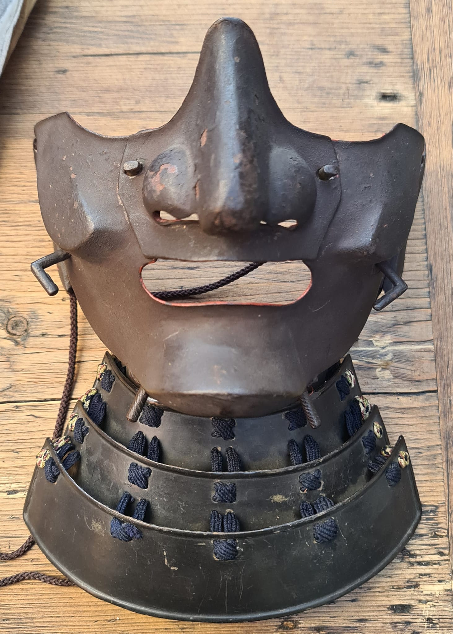 Russet iron samurai helmet with ore-kugi anchors