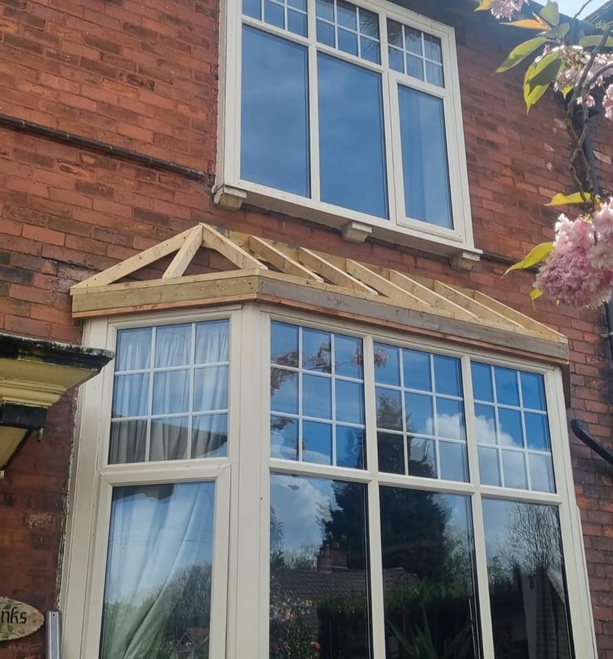 Kenny Roofing Flat roof to pitched roof over bay window...