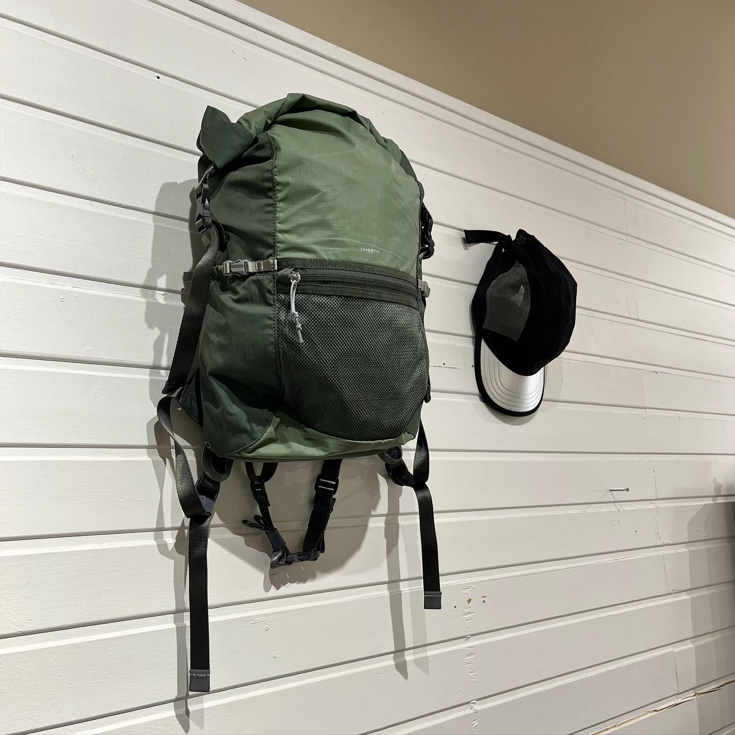 The Sky - Sandqvist “noa” backpack and Ciele speed cap looking 