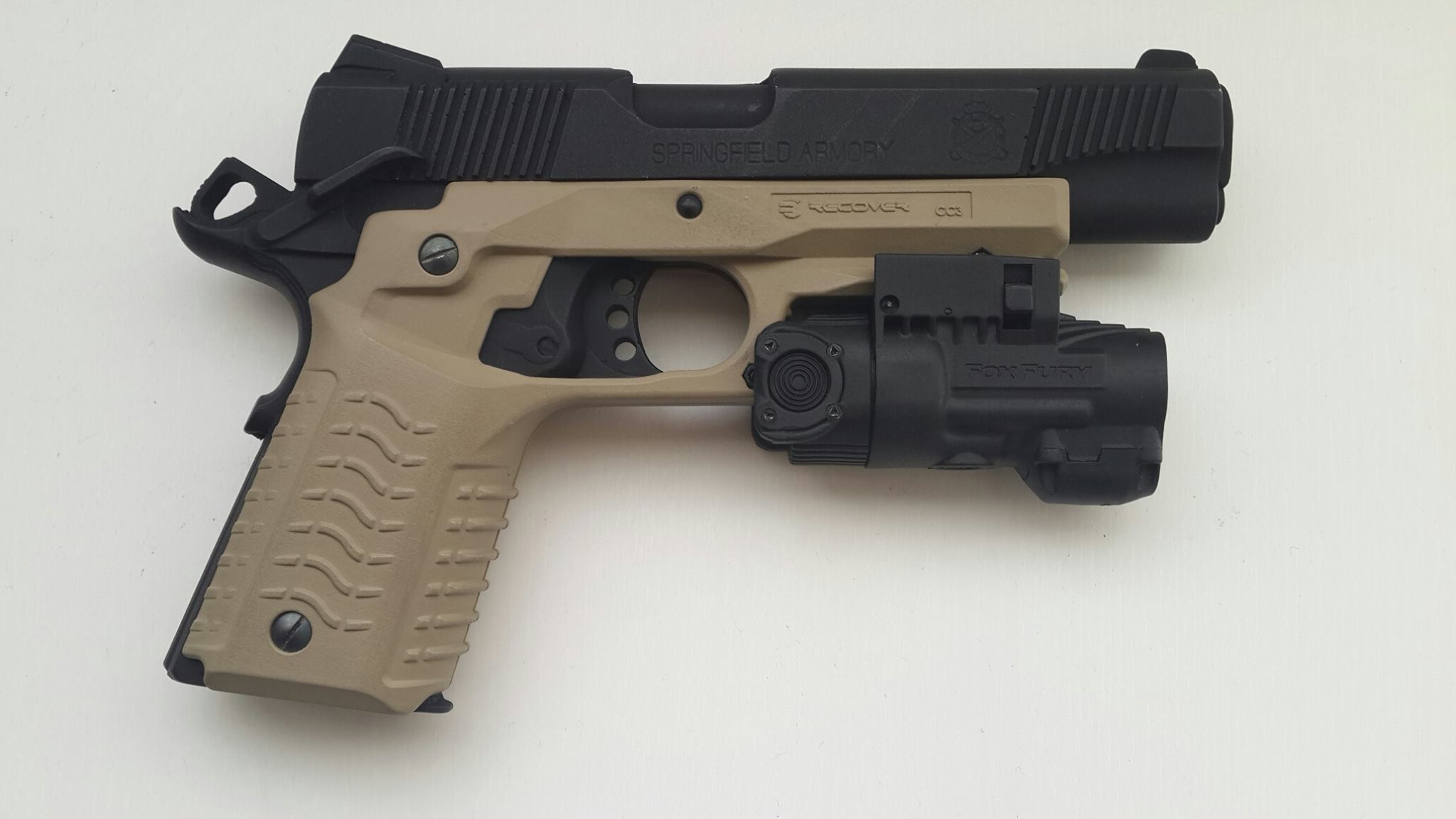 ReCover CC3 grip on a Springfield 1911 model with a Focus 1911 EMC