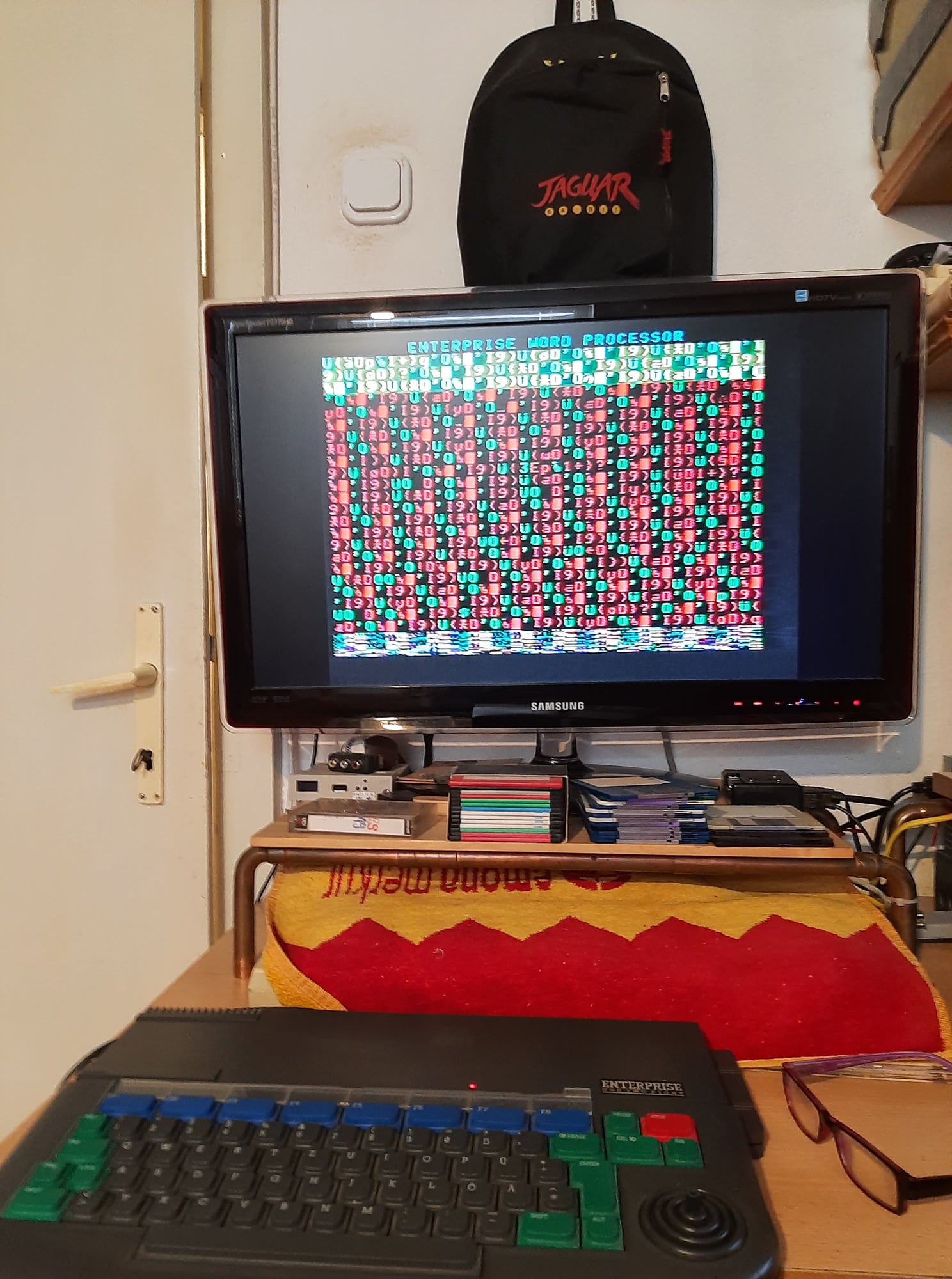 Why does my Enterprise 128 computer screen fill with garbage?