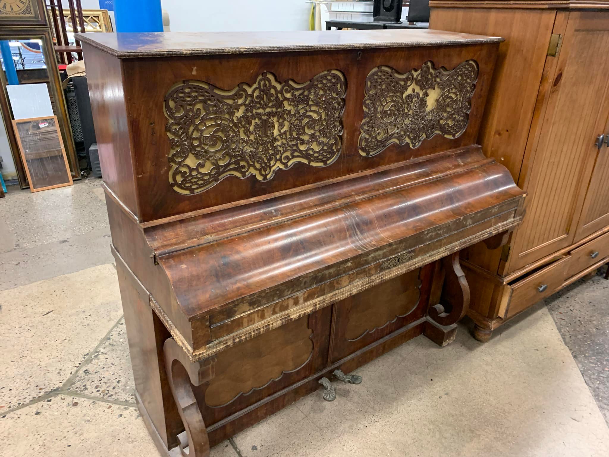 Antique piano found at Phoenix Goodwill store