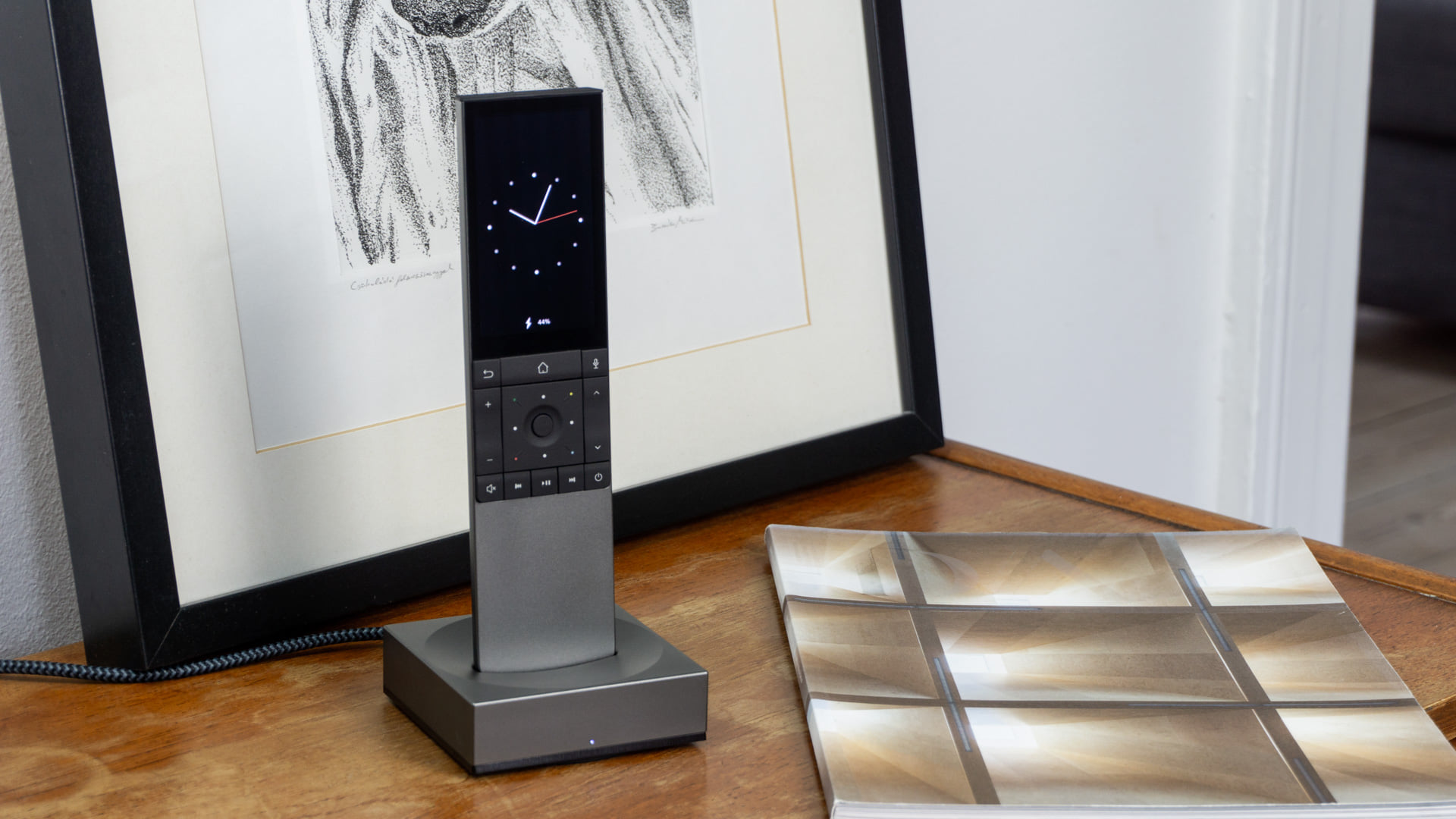 YIO Remote - The dock not just charges the remote, but has...