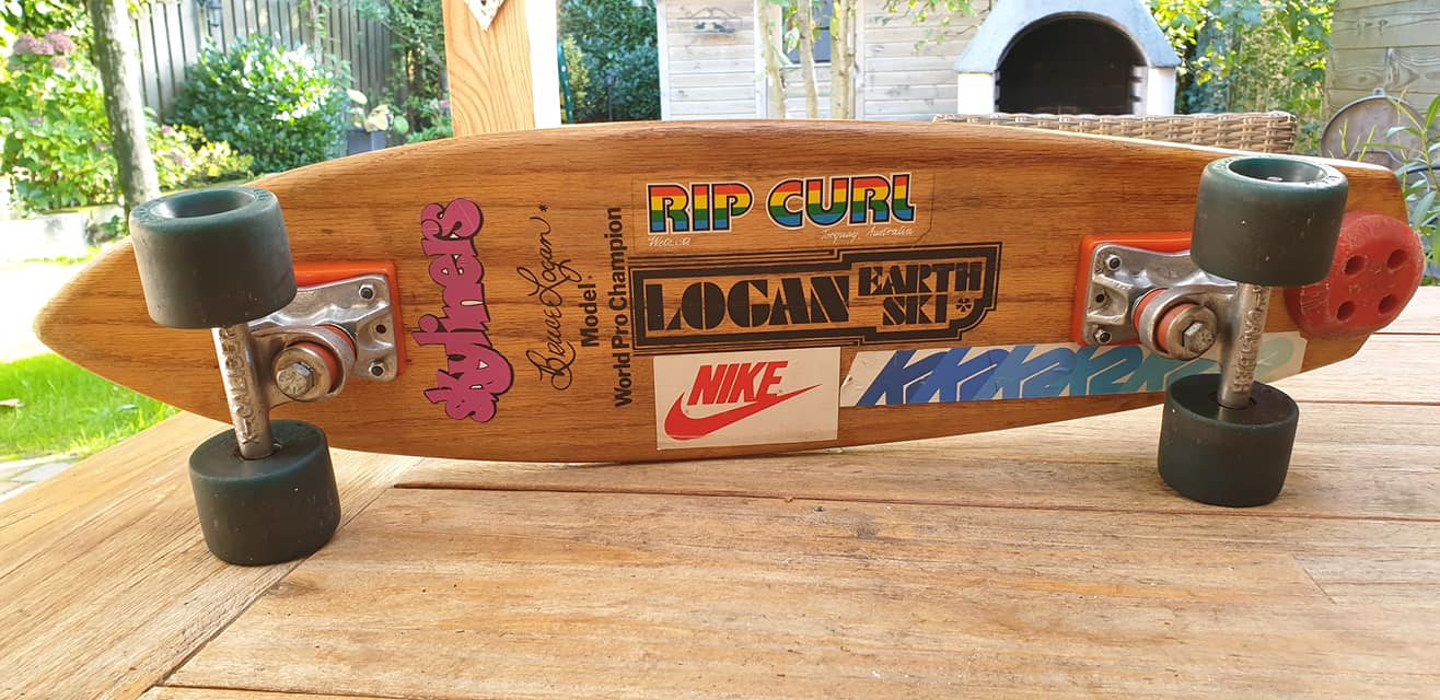 What year is this Logan Earth Ski skateboard and what is its worth?