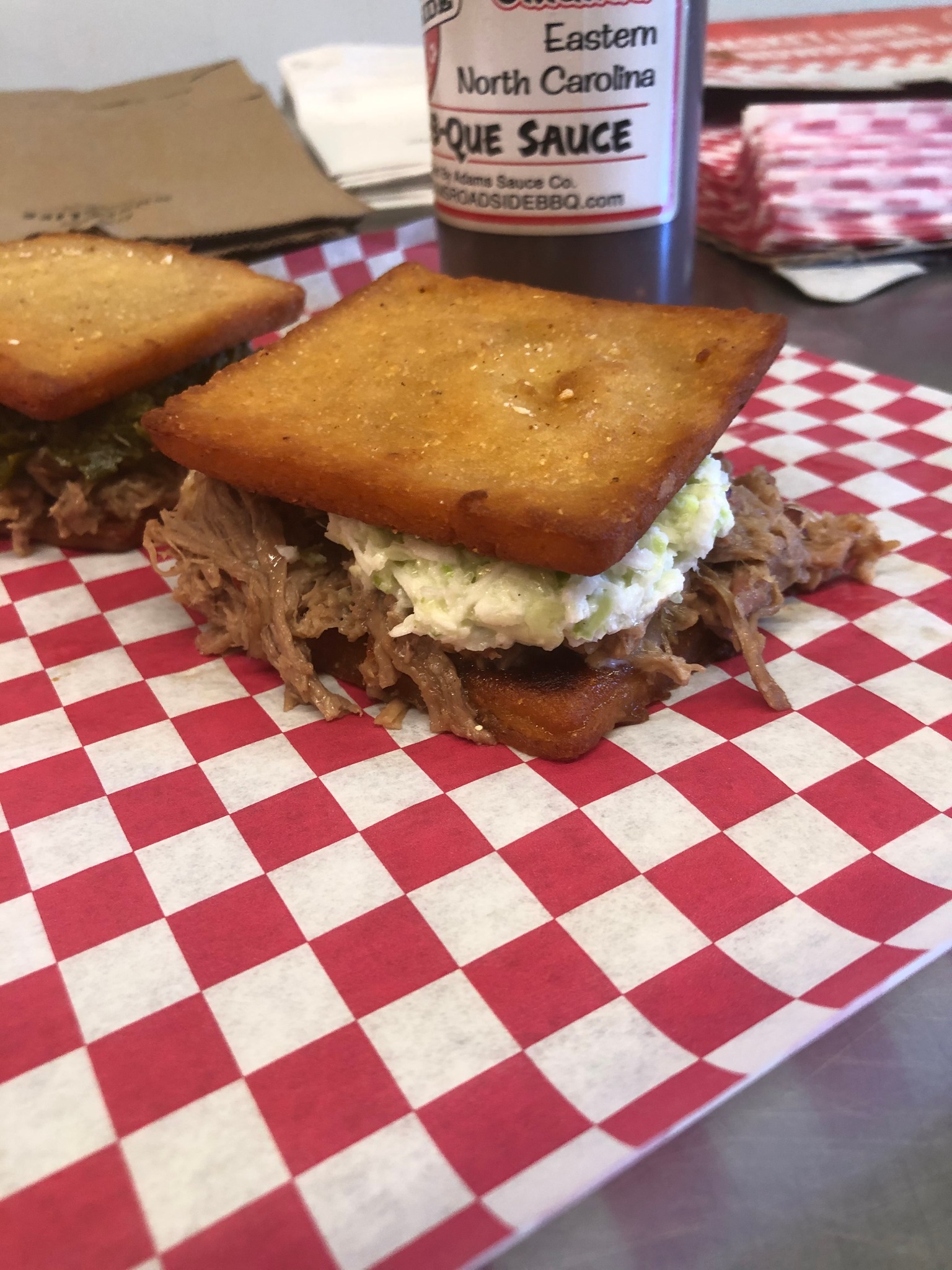 The Cornbread BBQ Sandwich makes its... - Adams Roadside BBQ
