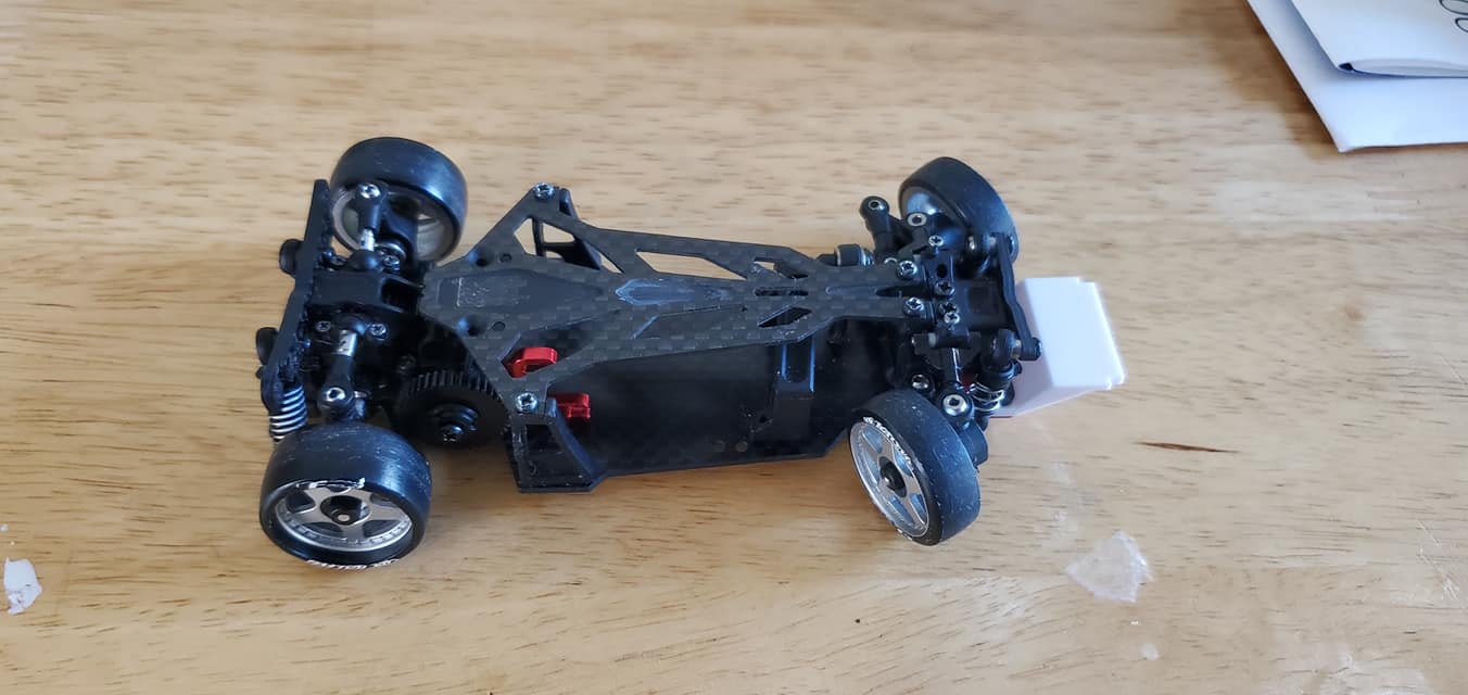 What kits can upgrade a 1/28 Atomic DRZ V2 chassis to 1/24 scale