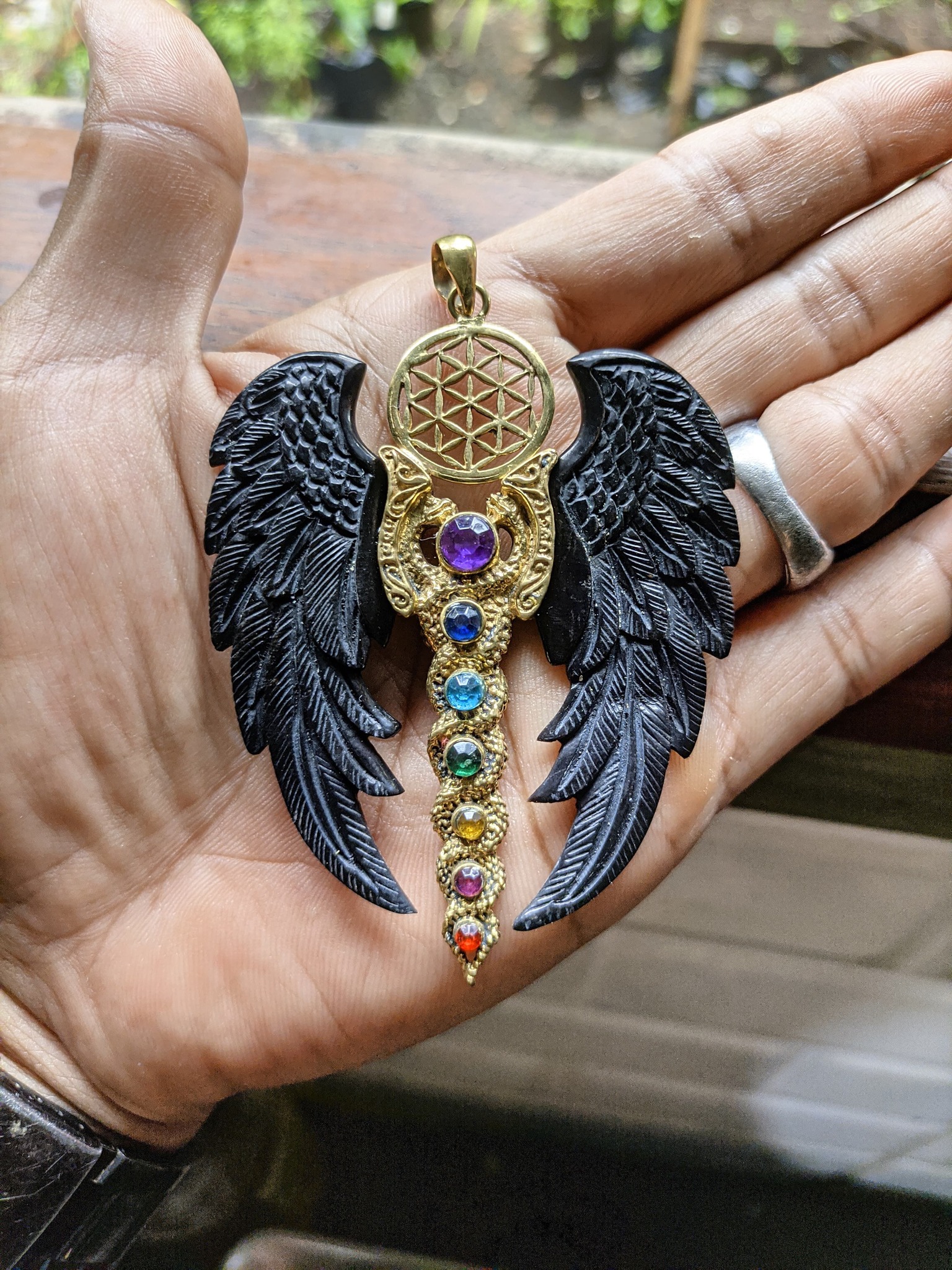 Angel wing pendant with sacred geometry for health and energy