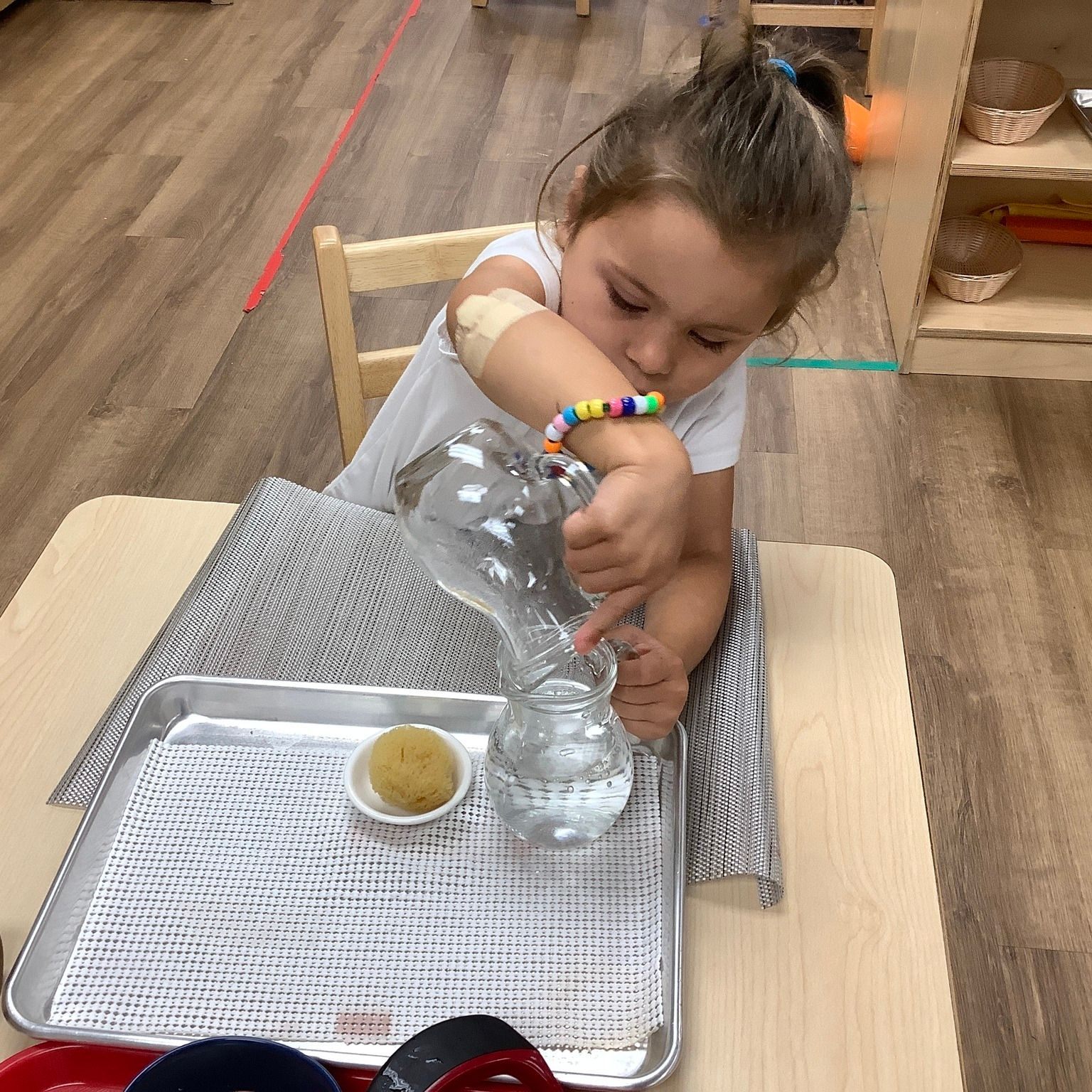 The Pouring... - Guidepost Montessori at South Riding