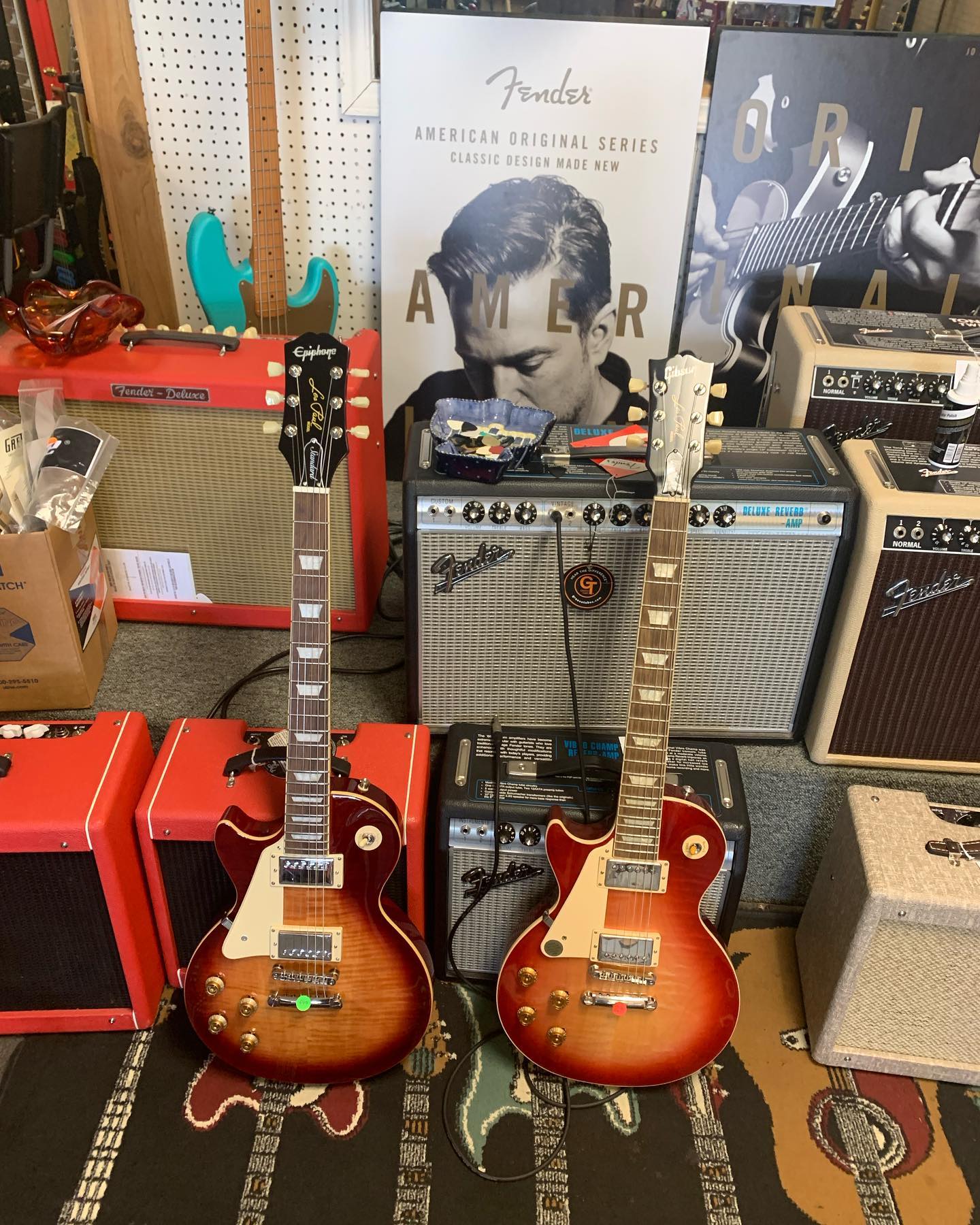 Comparison of 2006 Epiphone and 1996 Gibson Les Paul Standard guitars