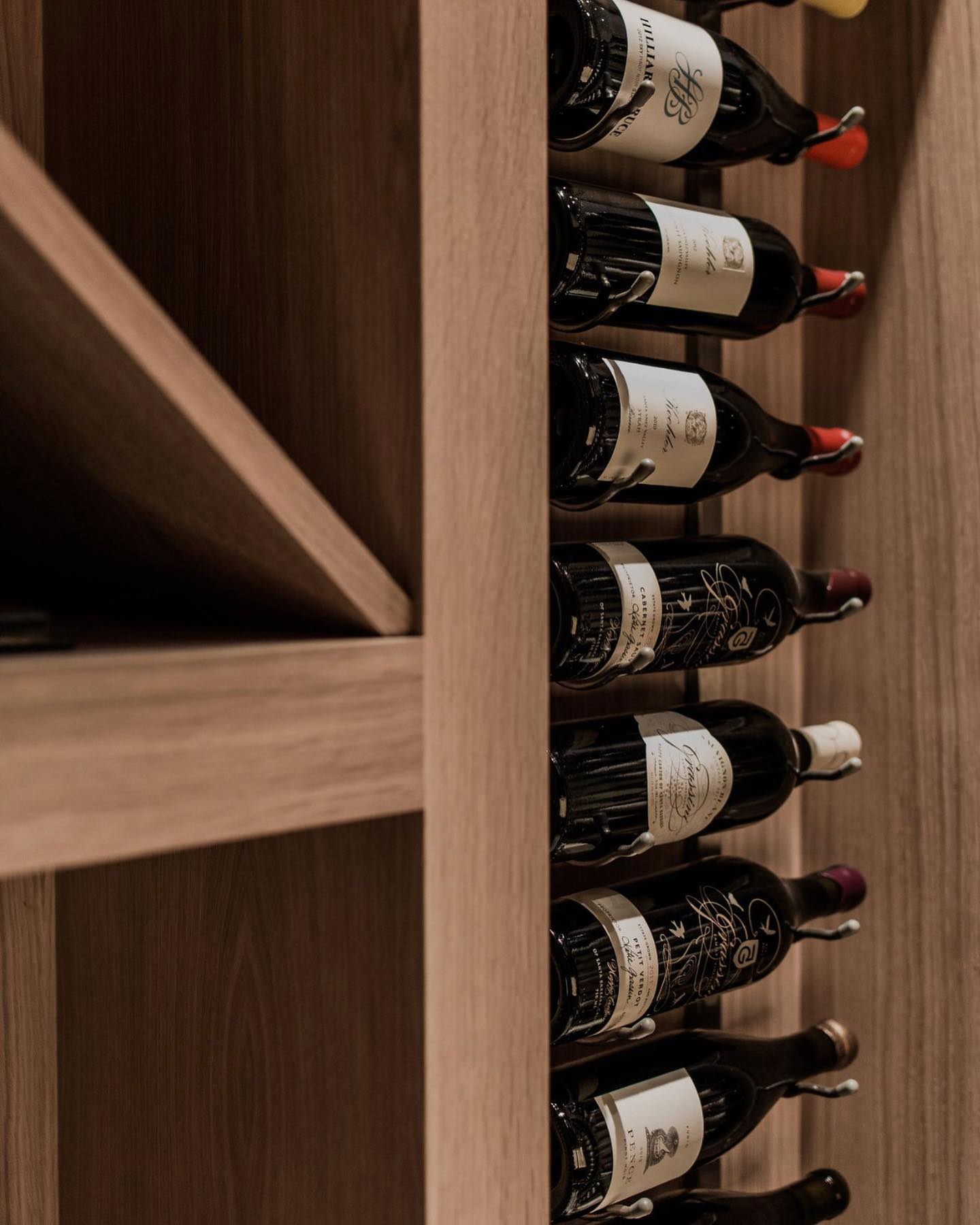 This custom white oak wine... - Loop Interior Design Inc. | Facebook