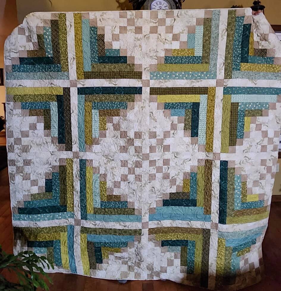 Hanging Gardens quilt with Essence of Pearl purple jelly roll