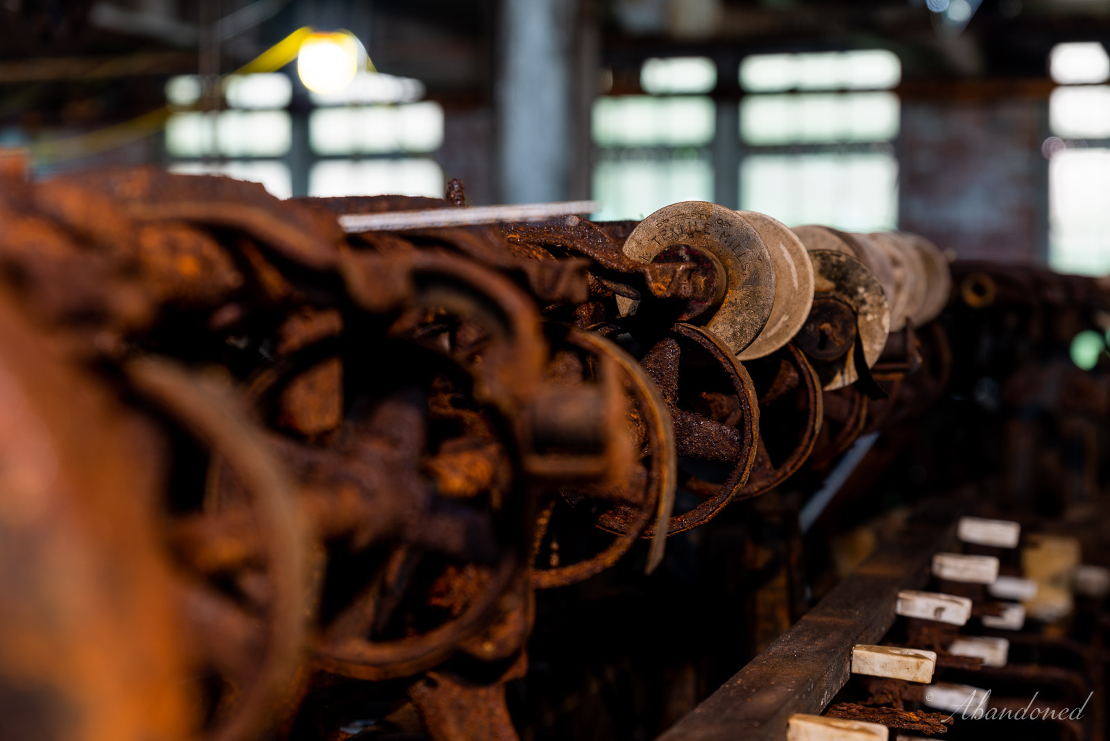 Abandoned - 📸 This is a view of abandoned spooling machines and ...