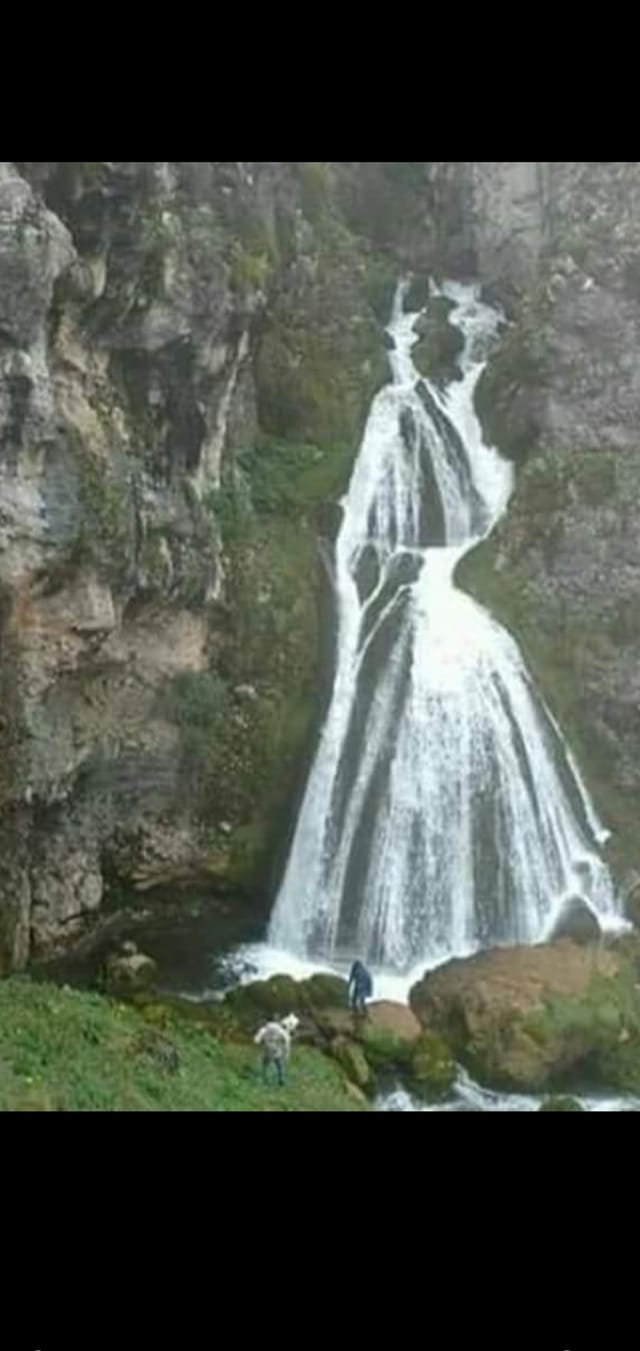 lady in a dress waterfall This looks like a 1940s tops