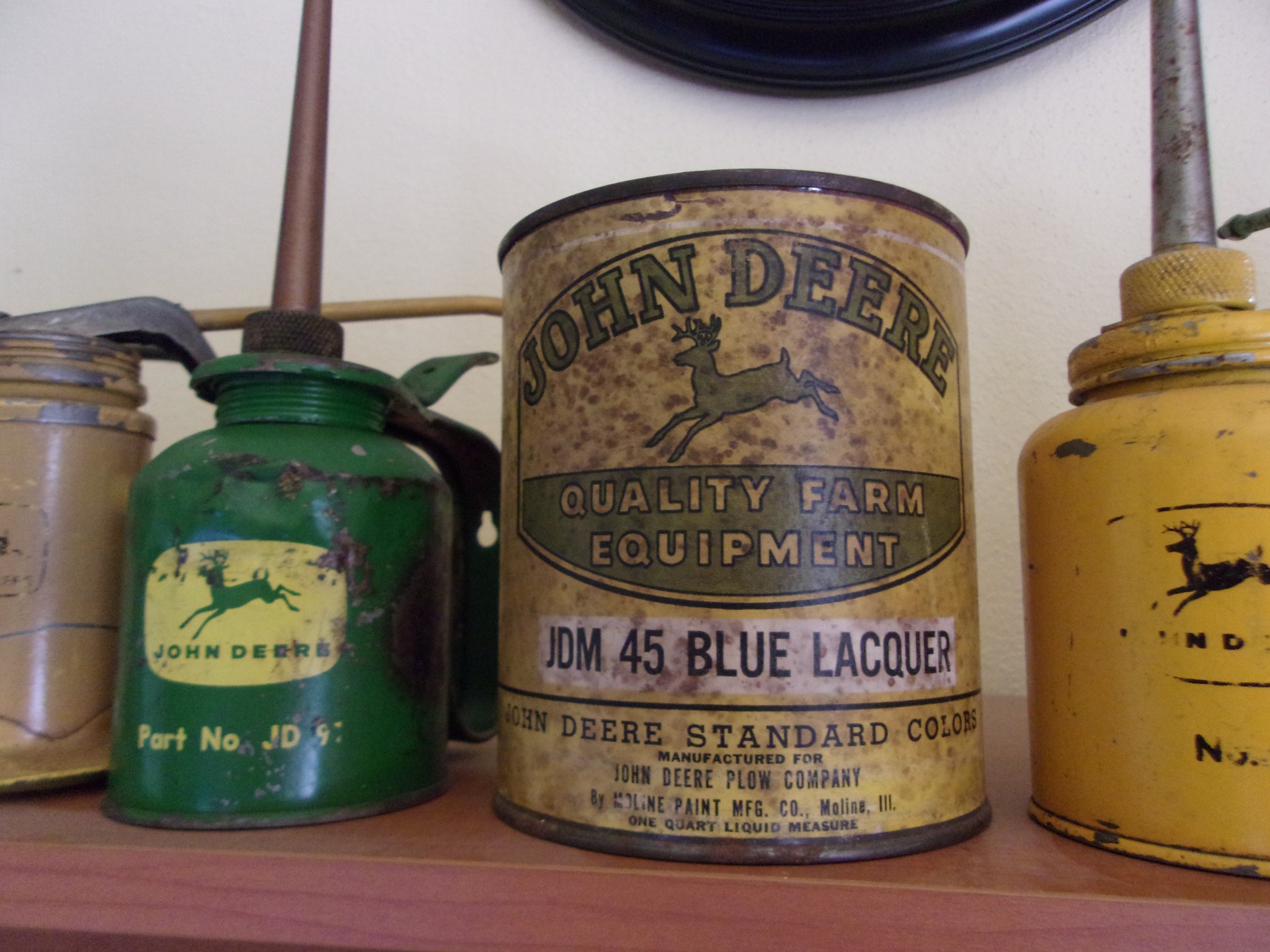 Did John Deere use blue lacquer on pre-1956 implements or tractors?