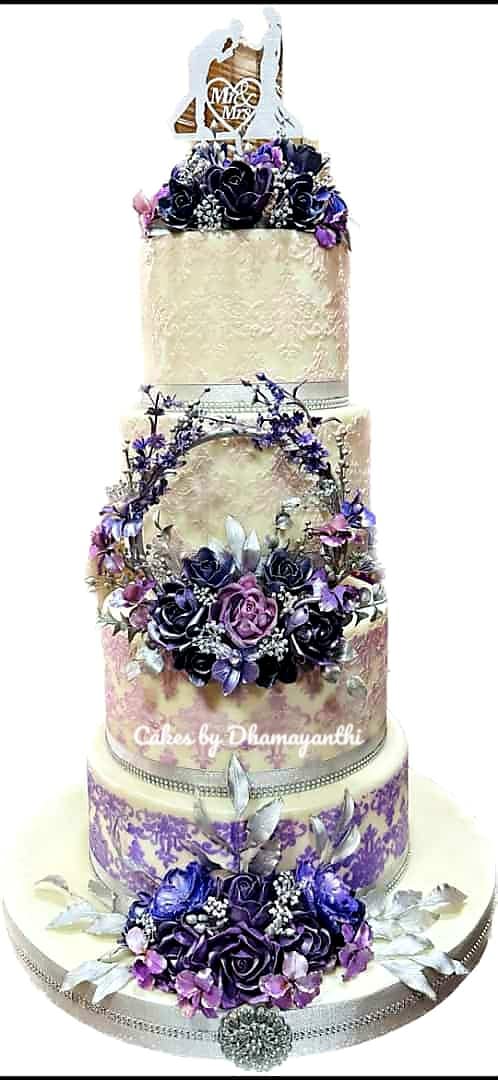 Cakes - 4 Tier Structure Cake decorated with Sugar Flowers for a ...