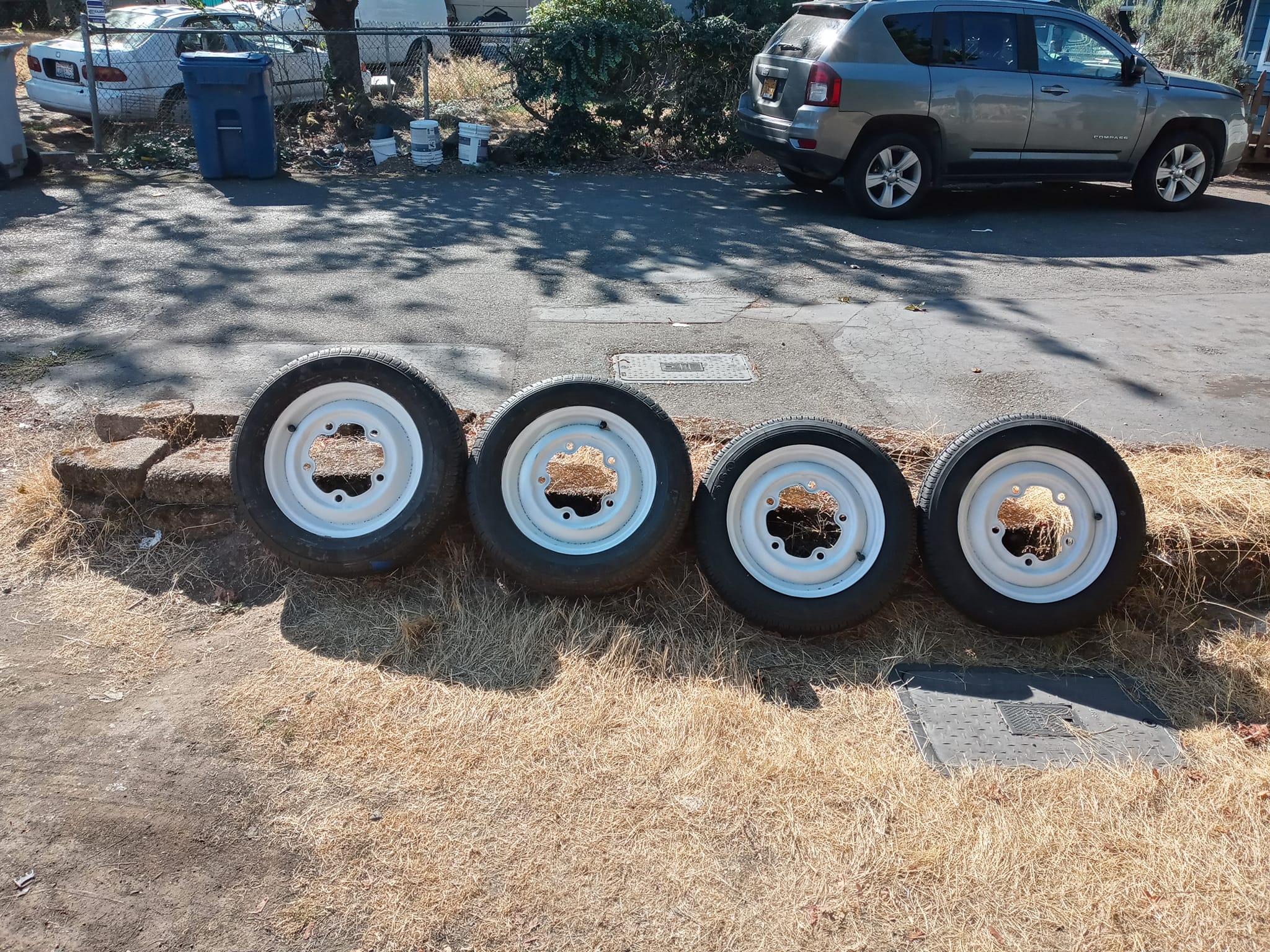 New white wheels installed on vintage Volkswagen