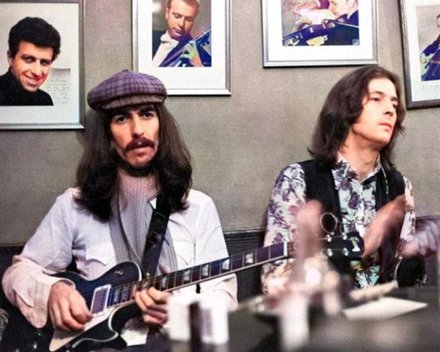 George Harrison and Eric Clapton.-.-.-
