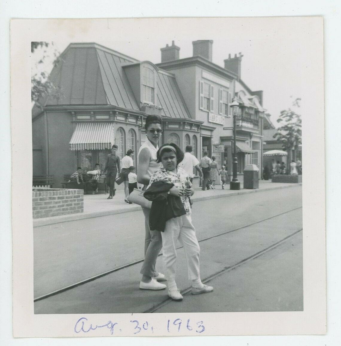 An unidentified woman and girl enjoyed the streets of Little Old New ...