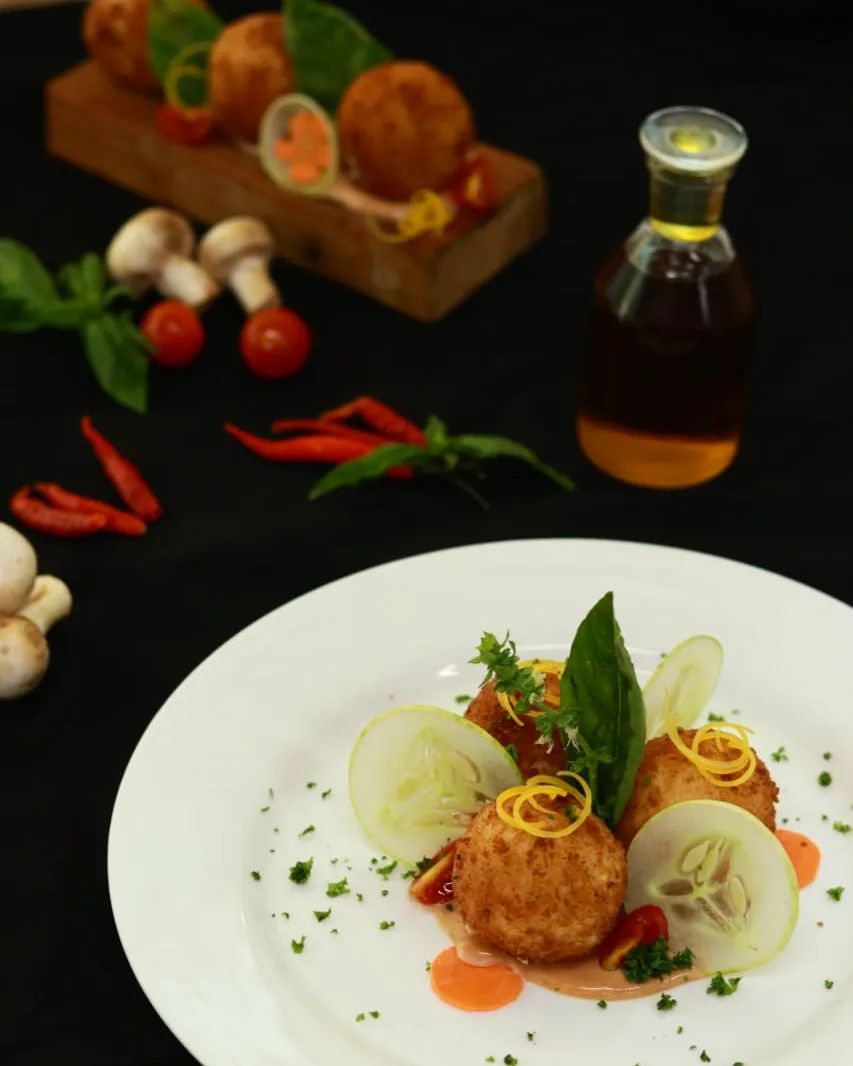 FoodFolder - Arancini are spherical, deep-fried rice balls made from ...