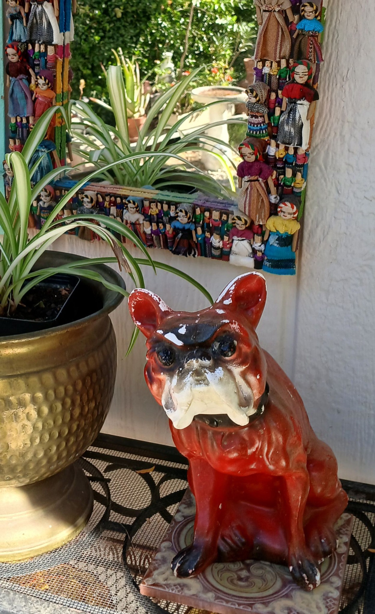 Vintage chalkware French bulldog on Green Acres