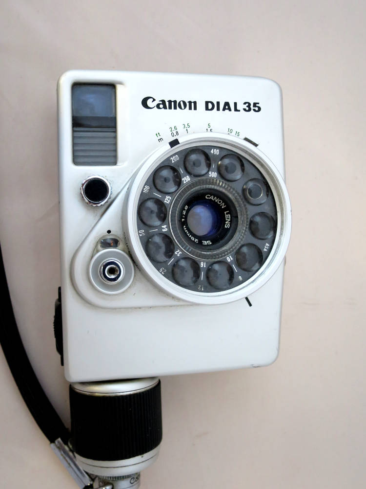 does anyone tried canon dial 35 bell and howell half frame camera