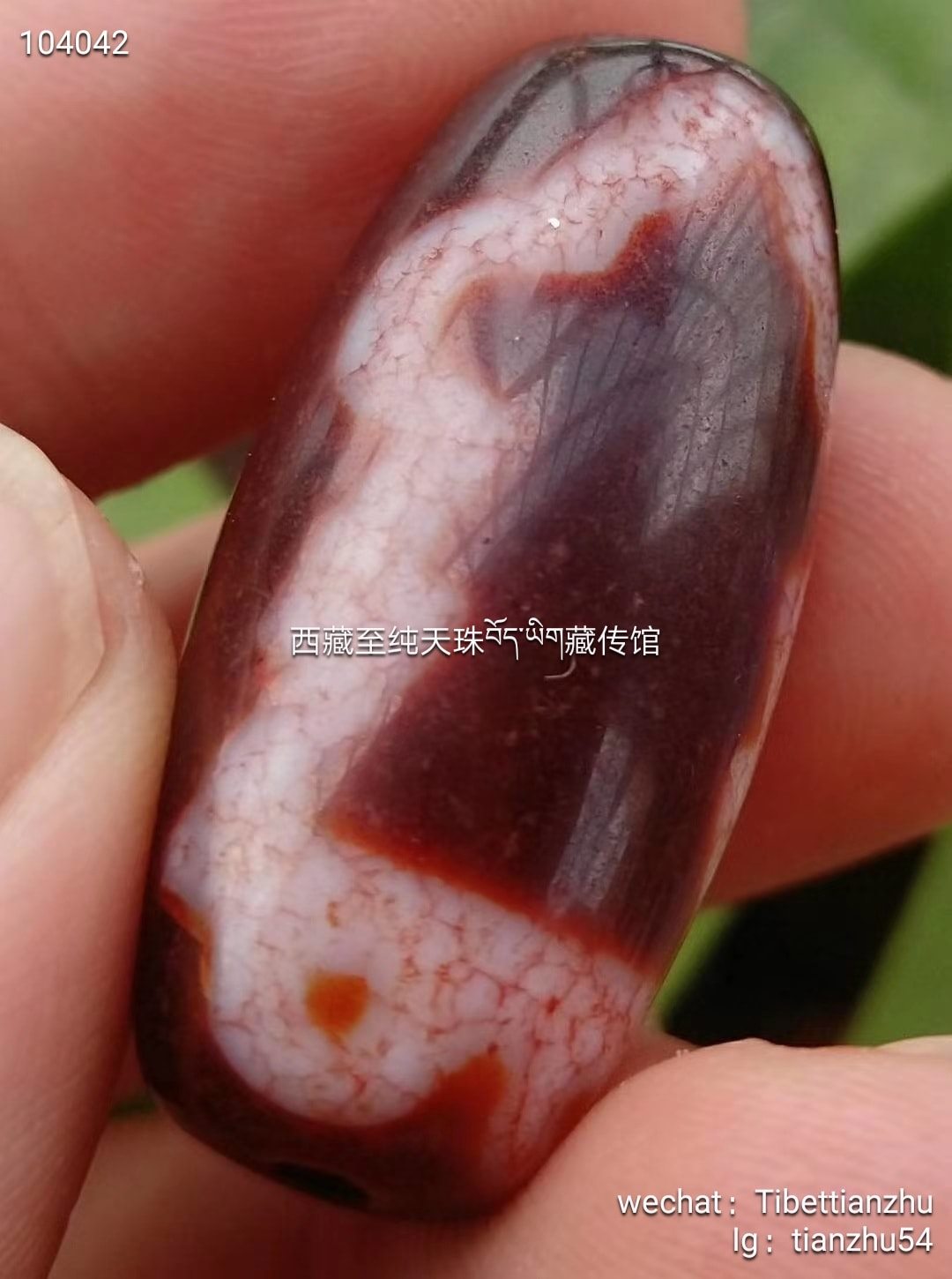 至純血絲龍紋双龍天珠　2-139 藏财神二眼天珠天然龙纹血丝，特殊图腾，只有一颗,好玩不贵尺寸31*15
