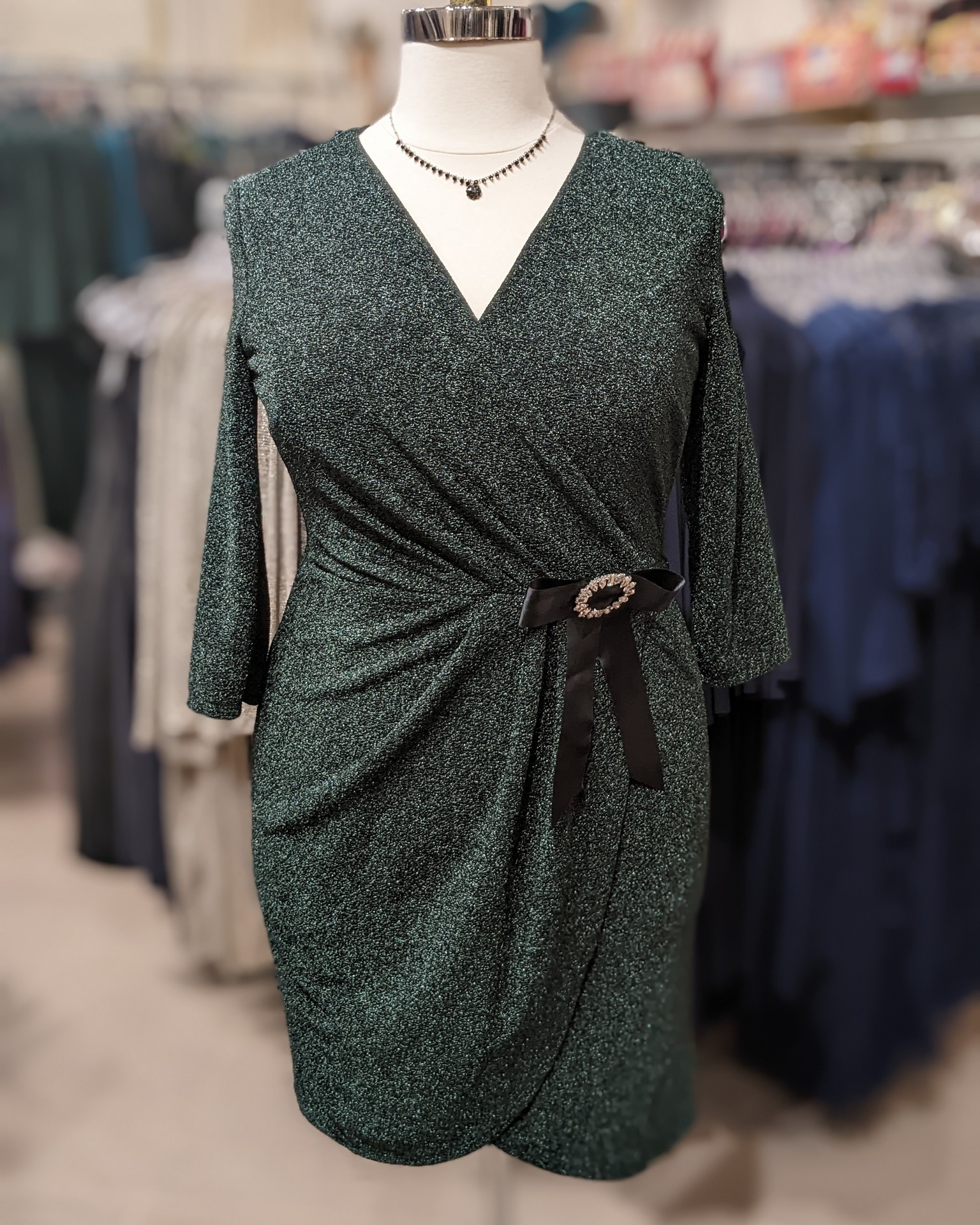 Emerald green sparkle dress with detachable bow brooch
