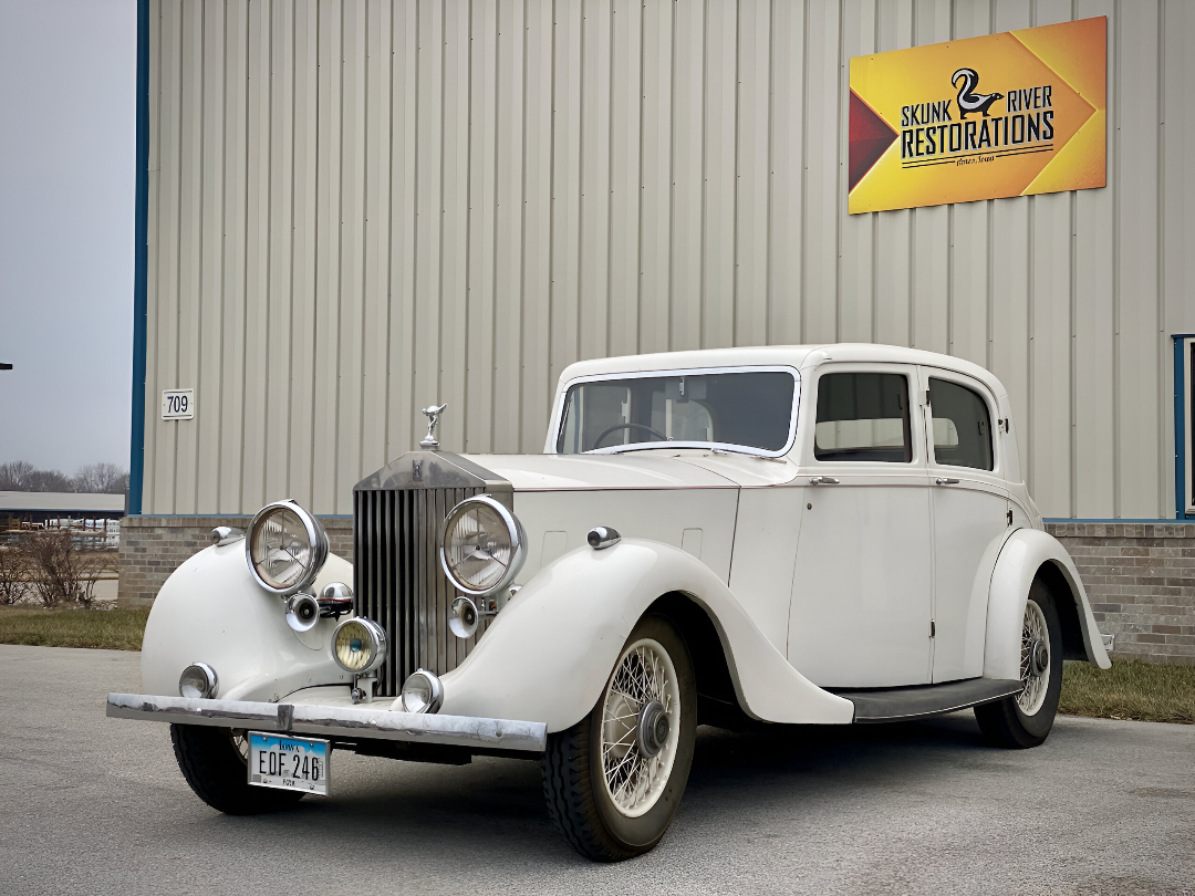 Elegant white Rolls-Royce 25/30 with classic design features