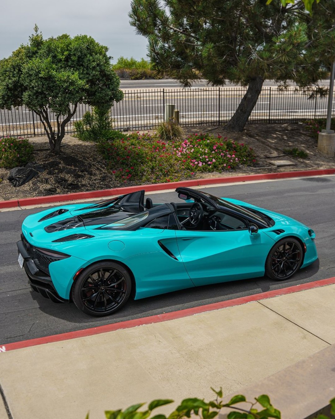 2025 McLaren Artura Spider finished in Tokyo Cyan over Black with