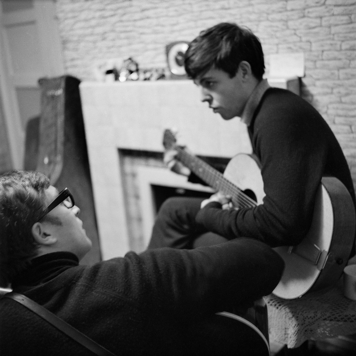 John Lennon and Paul McCartney writing at 20 Forthlin Road in 1962