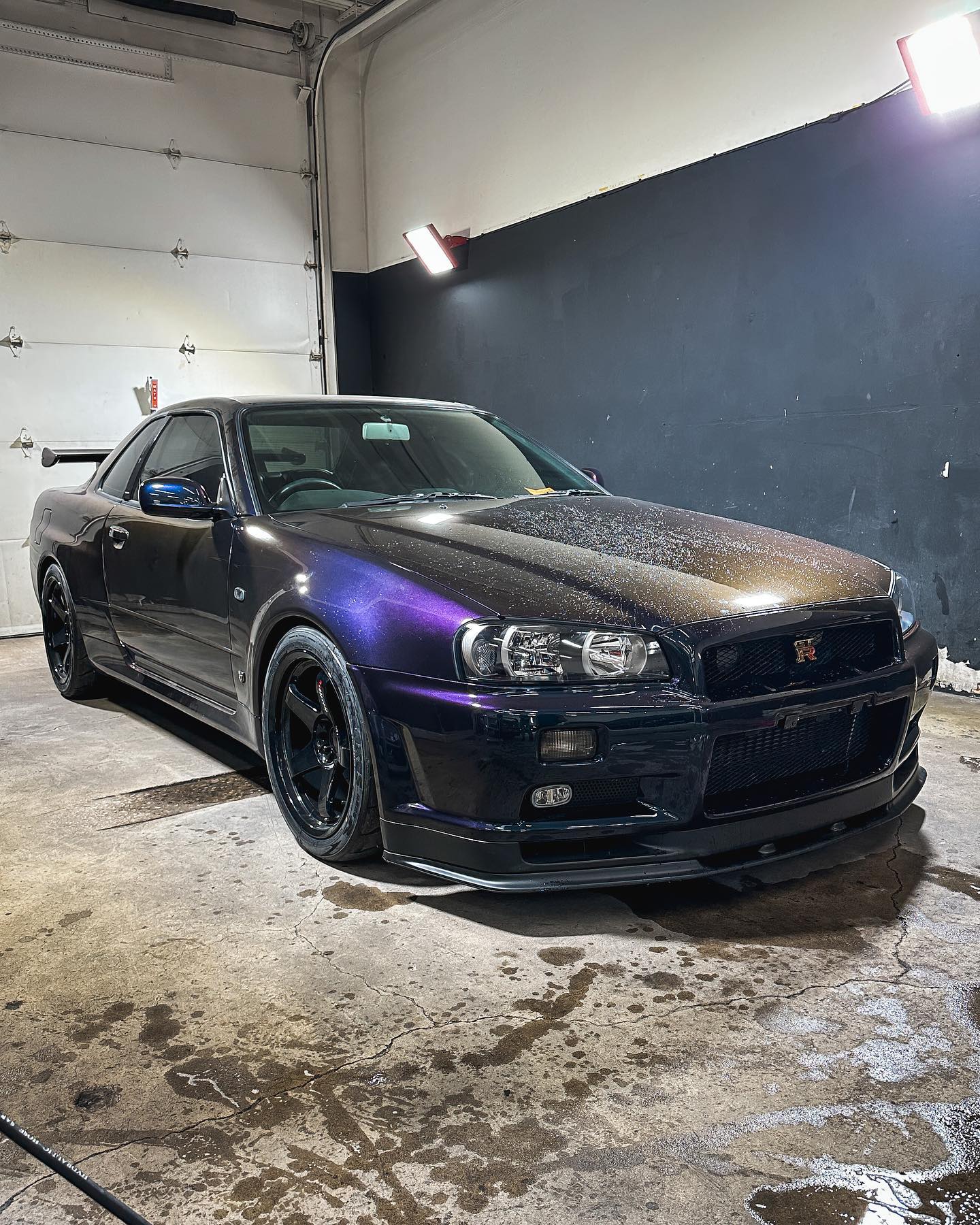 Revhard Motors - This Midnight Purple II R34 GT-R is in...
