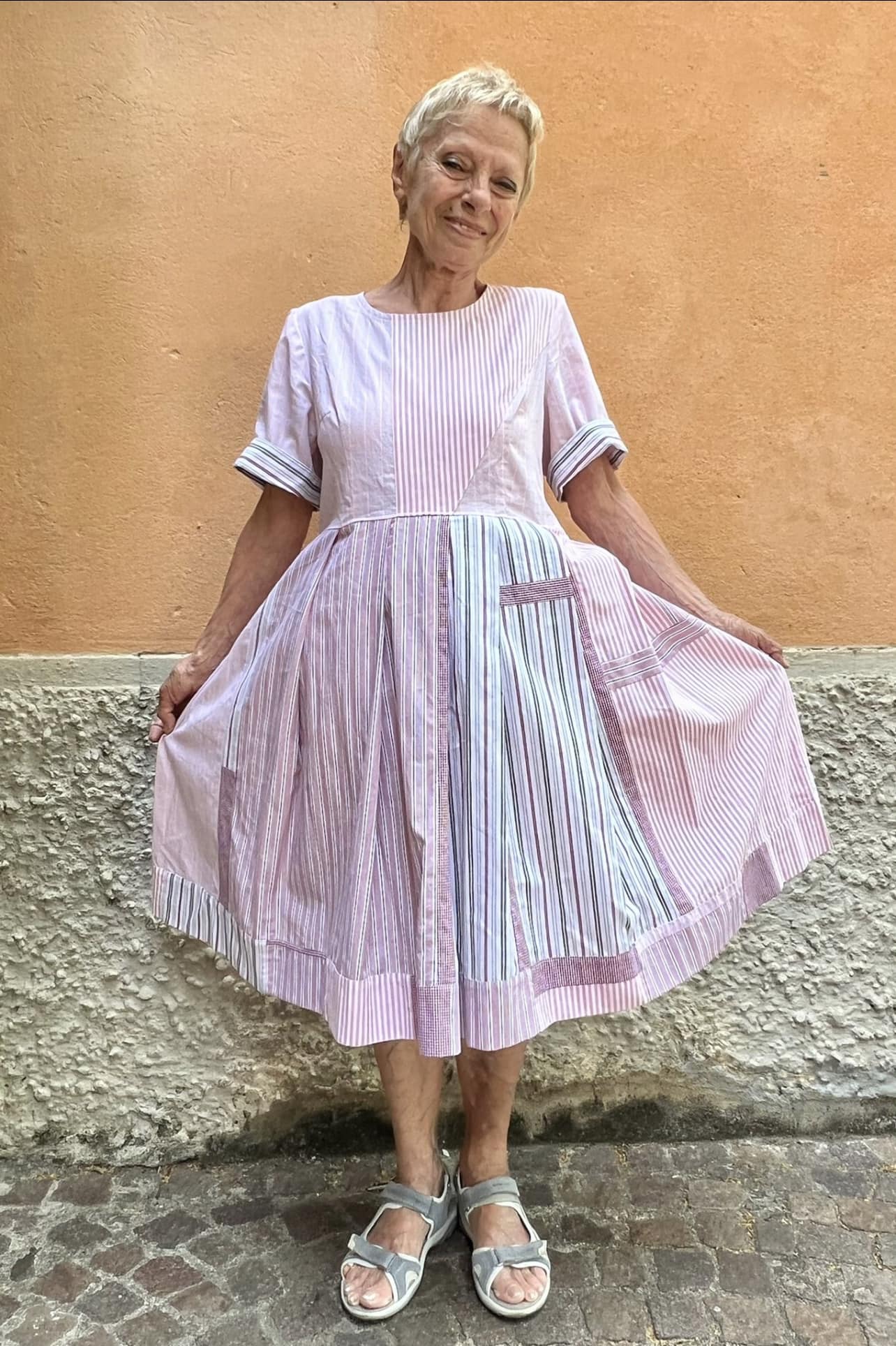 Maria Rosa sewed this dress using her husband