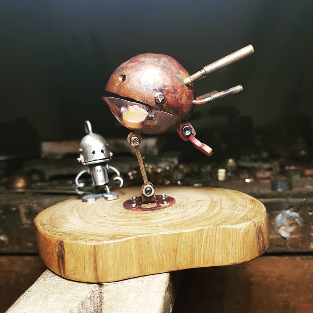 C J HAN - The silver robot follows the flying steam whale