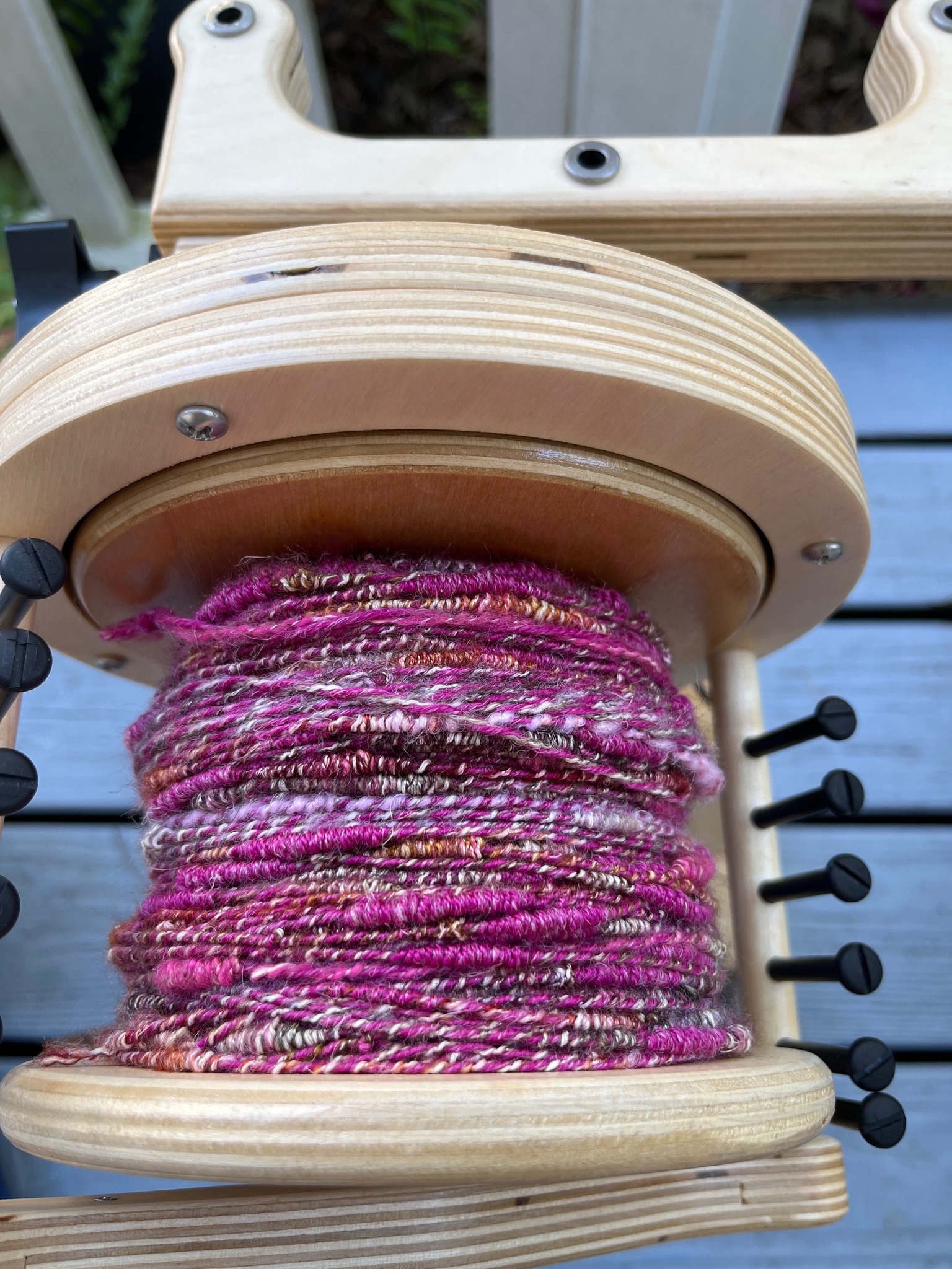 Cutting another small weaving off the loom. I really like this little ...