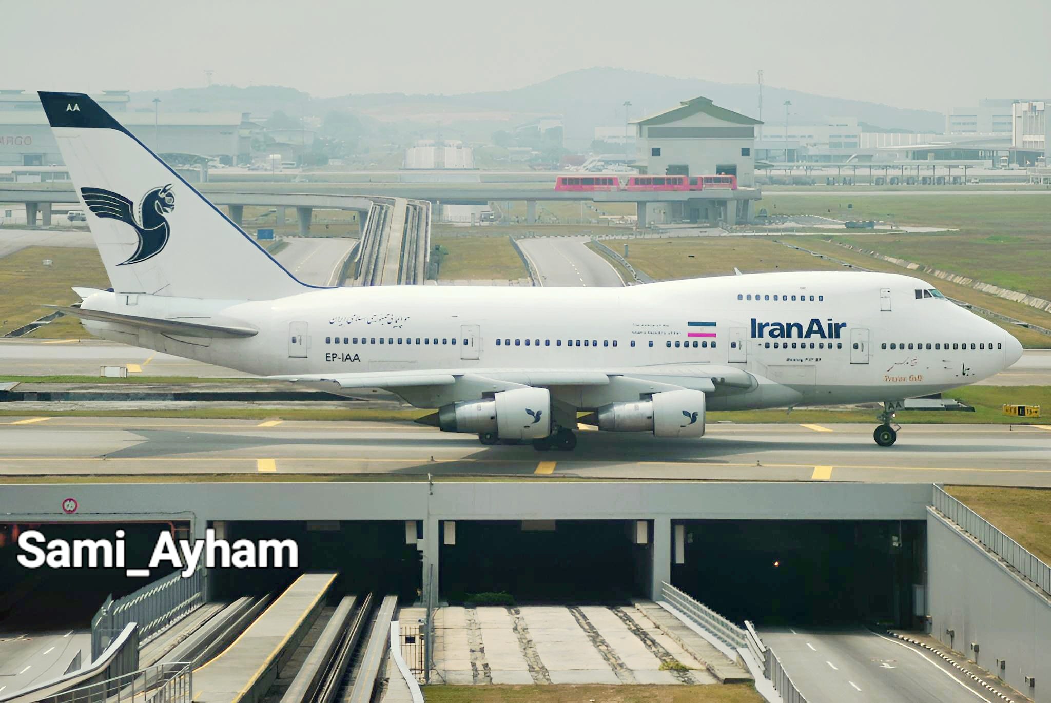 From my camera Iran Air Boeing 747-SP-86 EP-IAA taxing on bridge